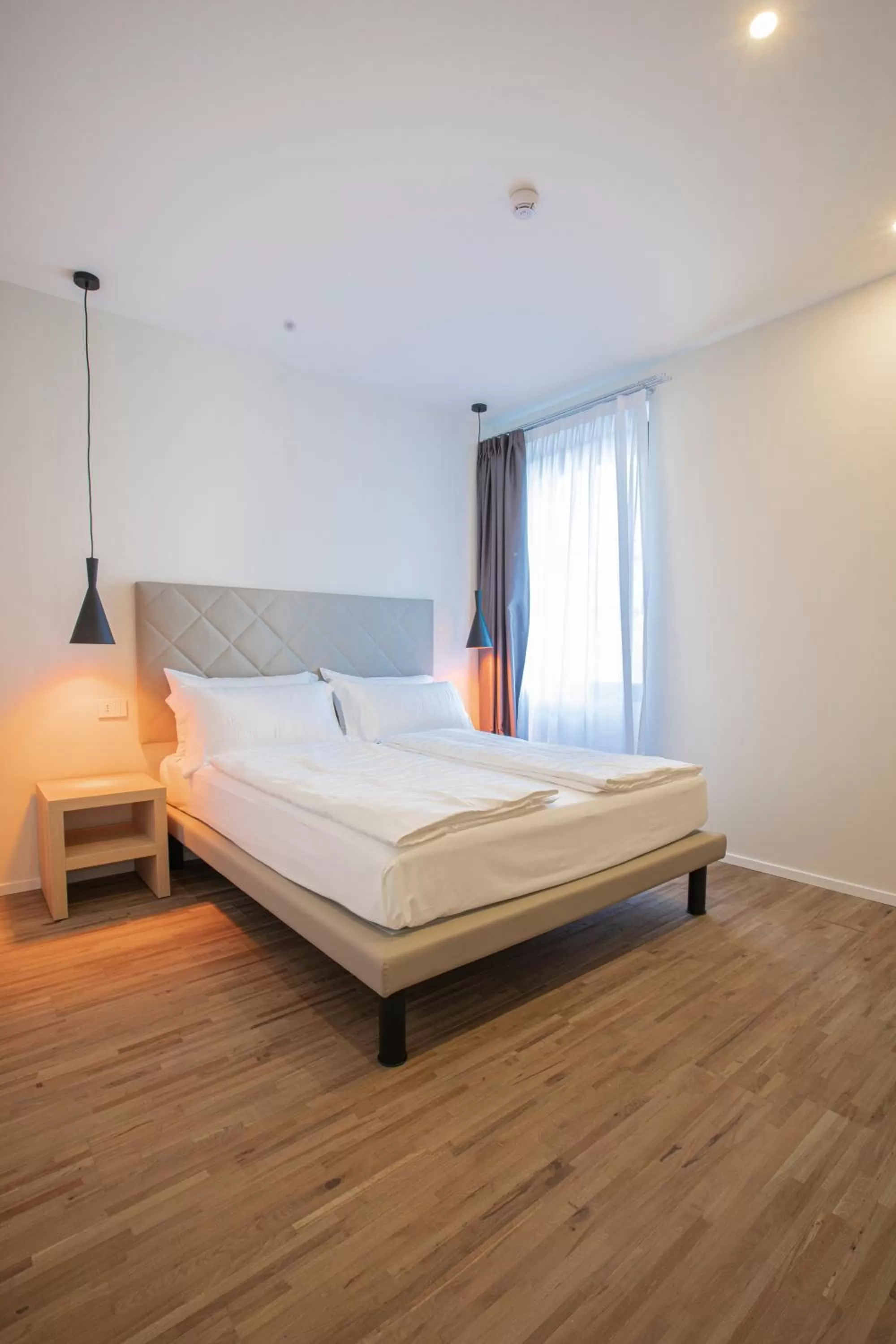 Bed in Ah Villaglori Boutique Apartments