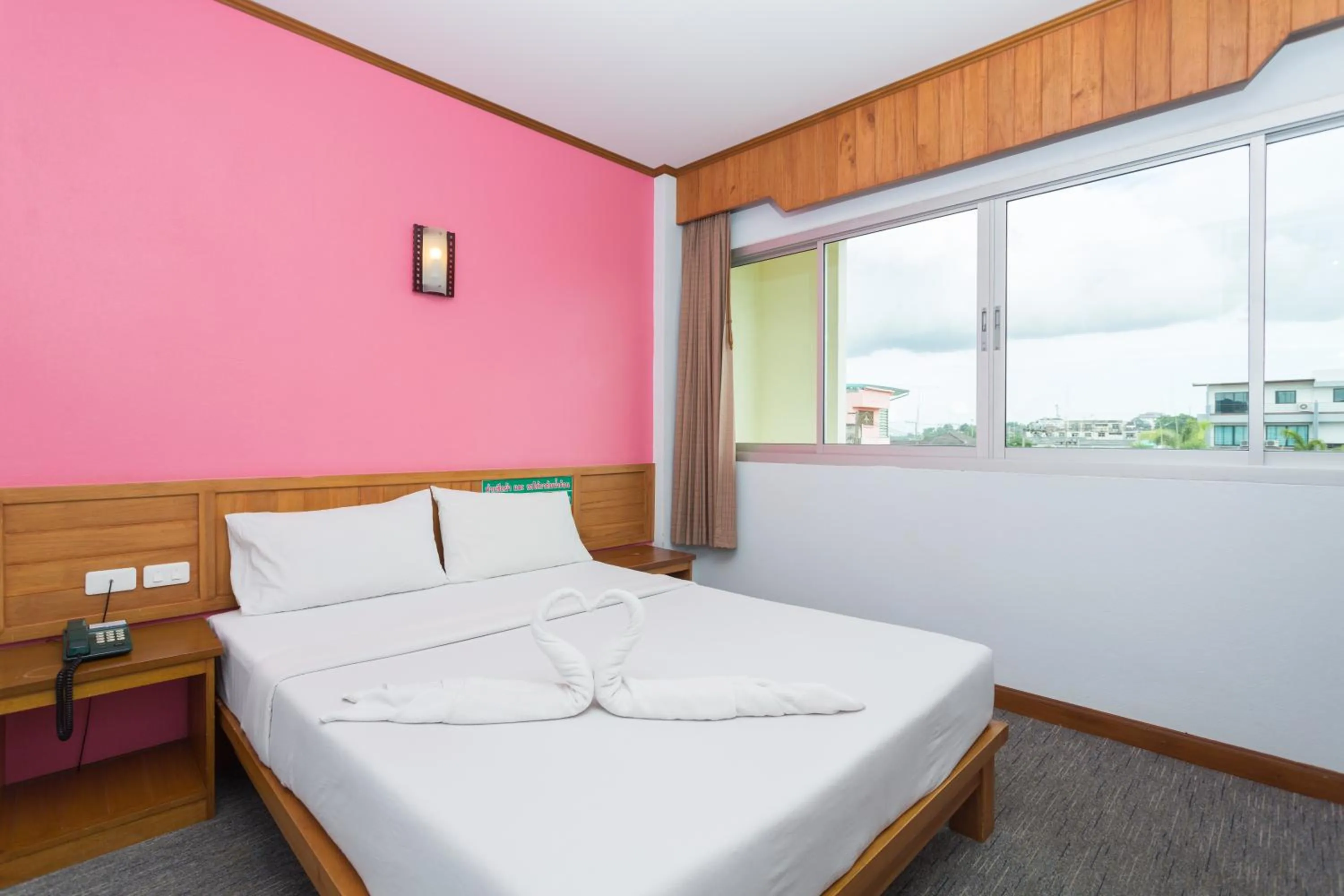 Bed in Riverside Hotel