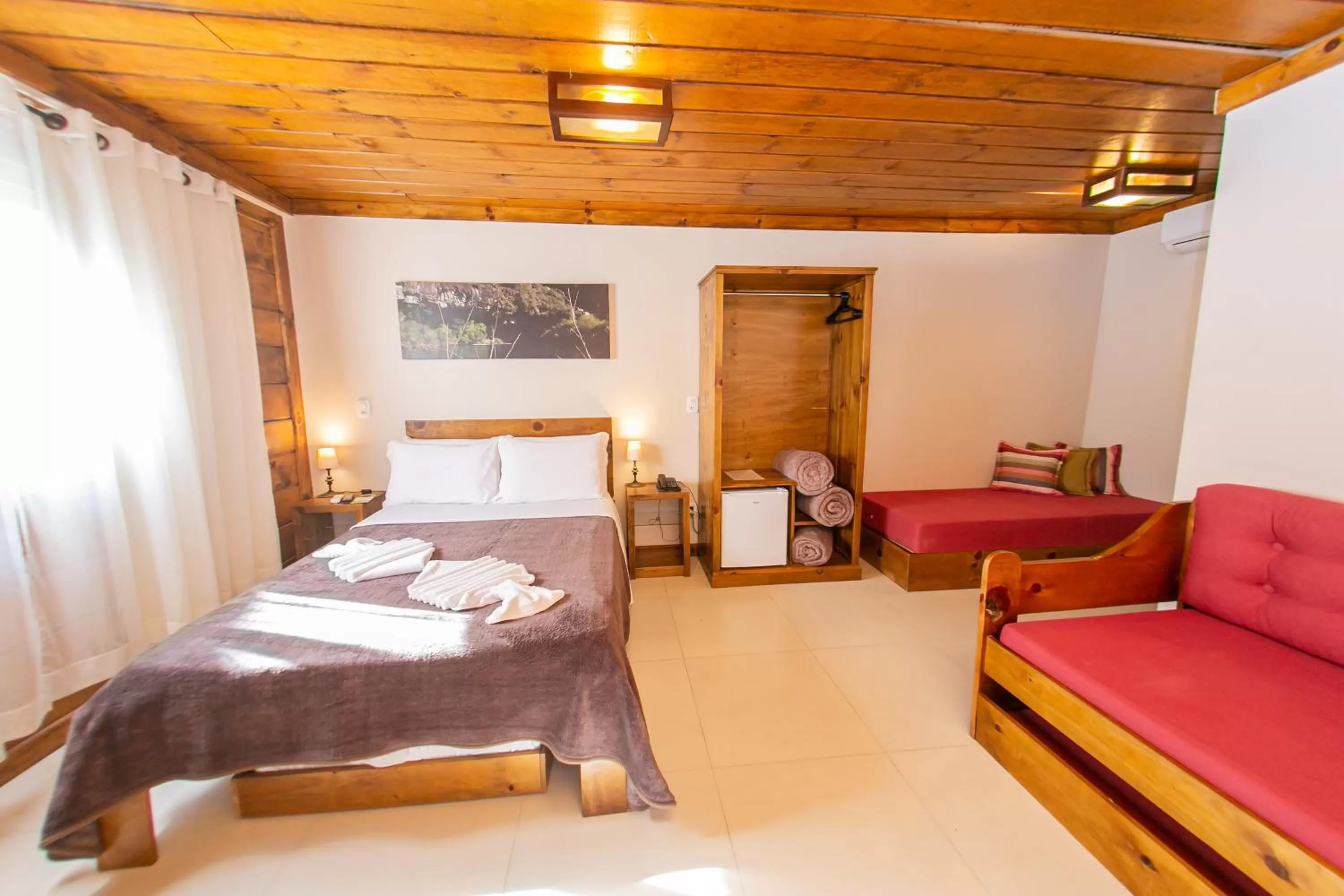 Bed in Pousada Charm Canela