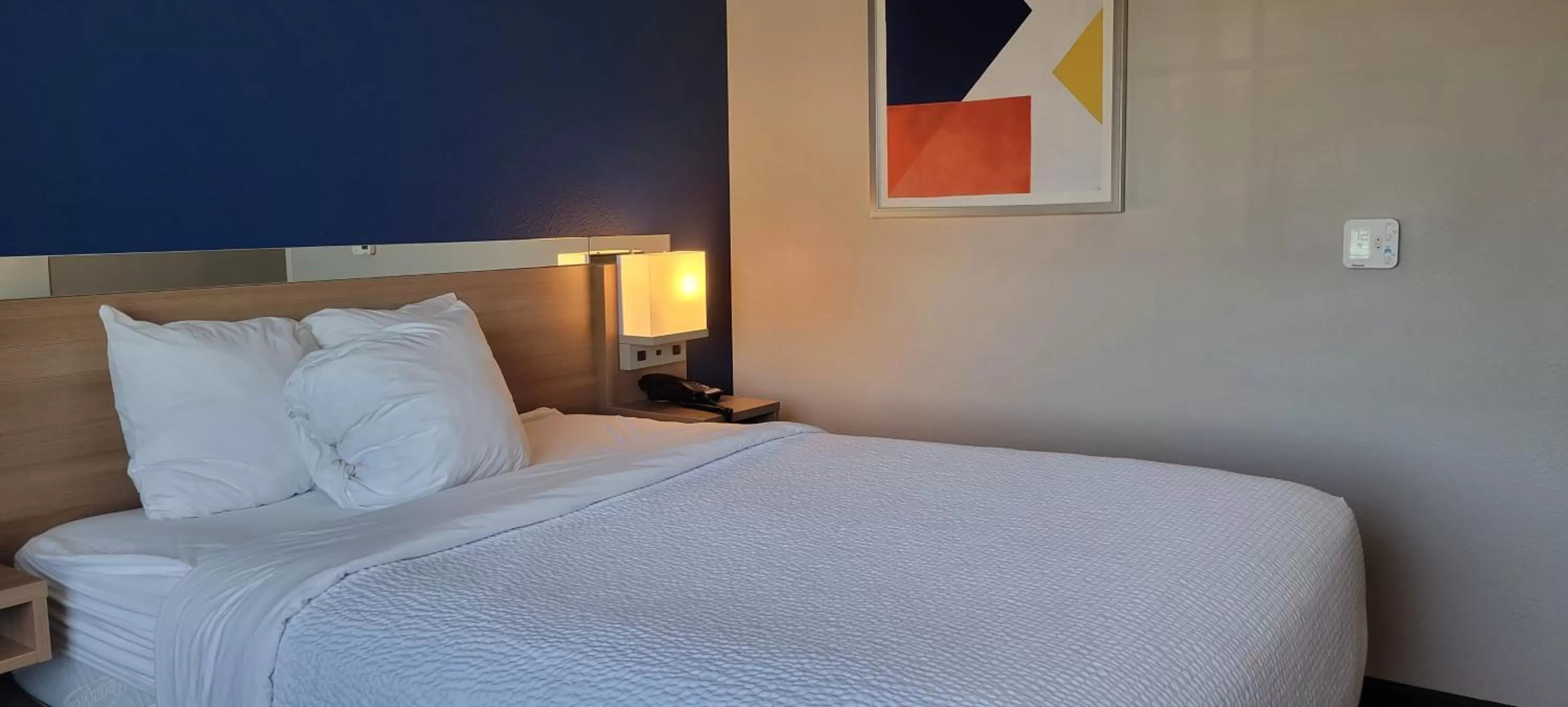 Bed in Microtel Inn & Suites by Wyndham Fountain Fort Carson