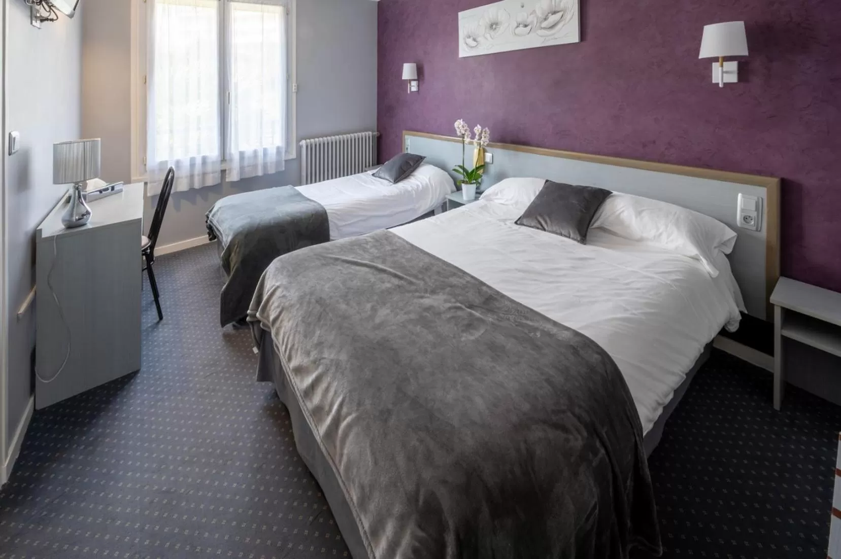 Bed in Hôtel du Soleil Levant