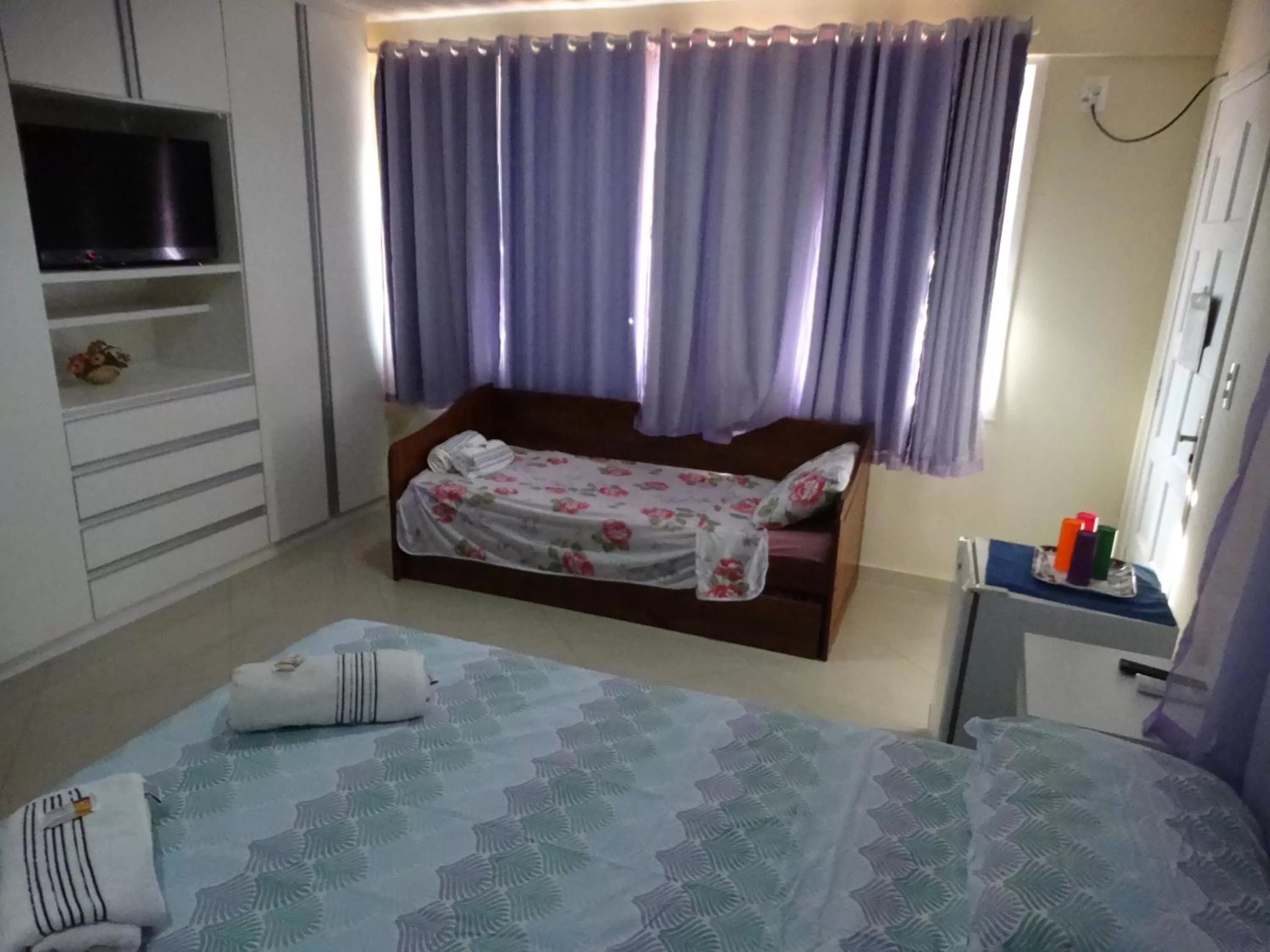 Bed in Pousada do Nei