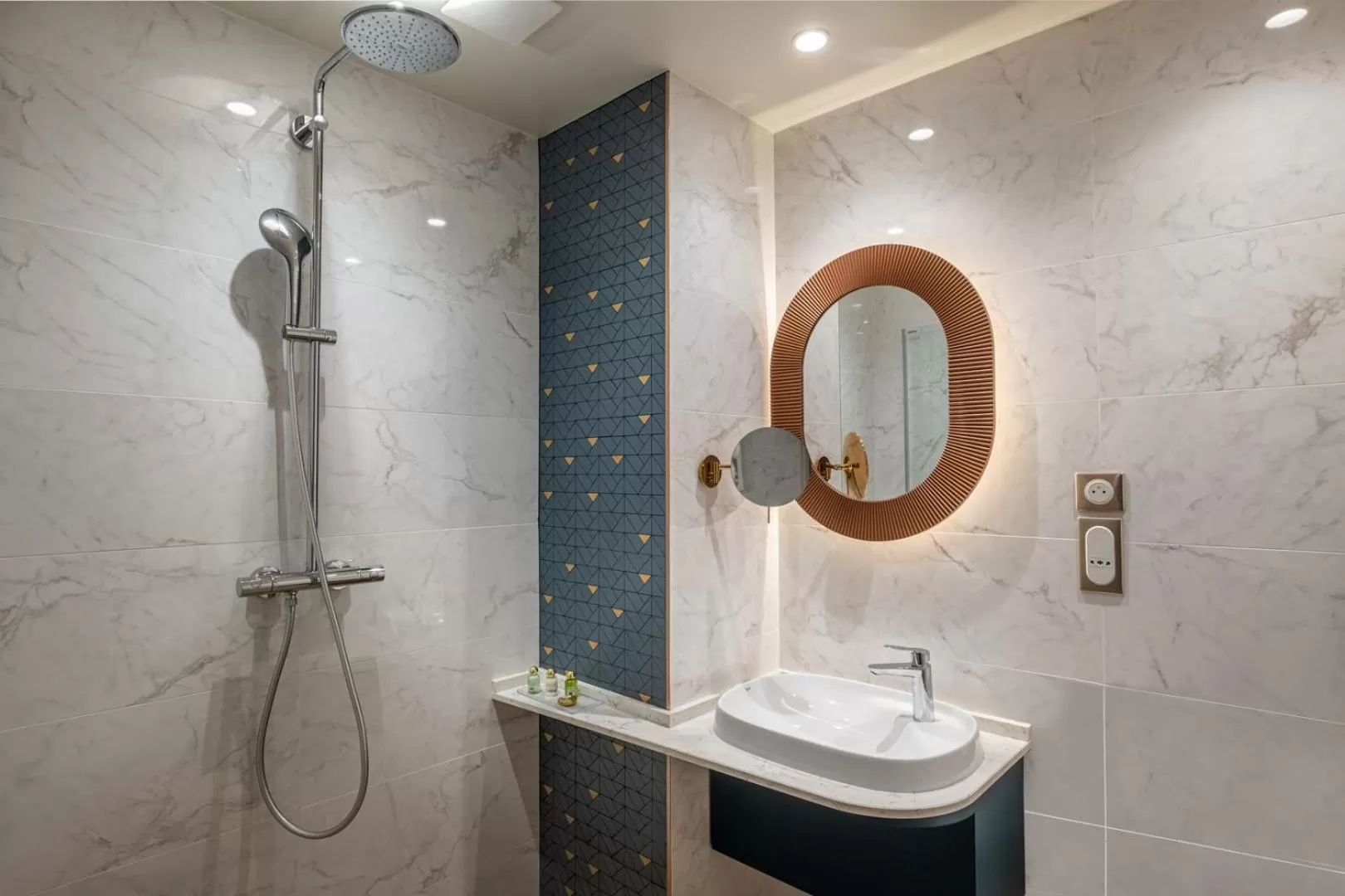 Bathroom in Hôtel Le Tourville by Inwood Hotels