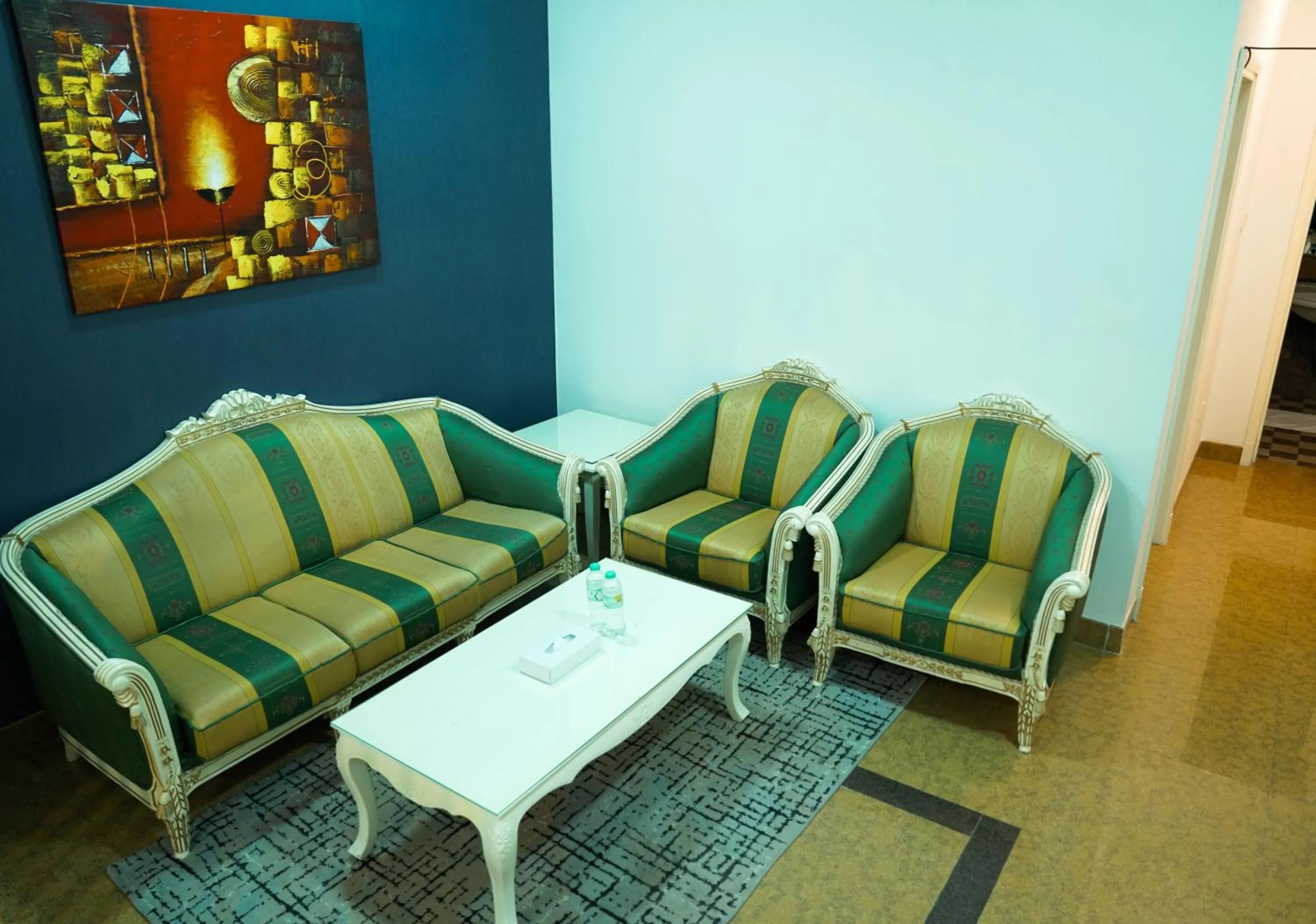 Seating area in Safeer International Hotel By Brothers International