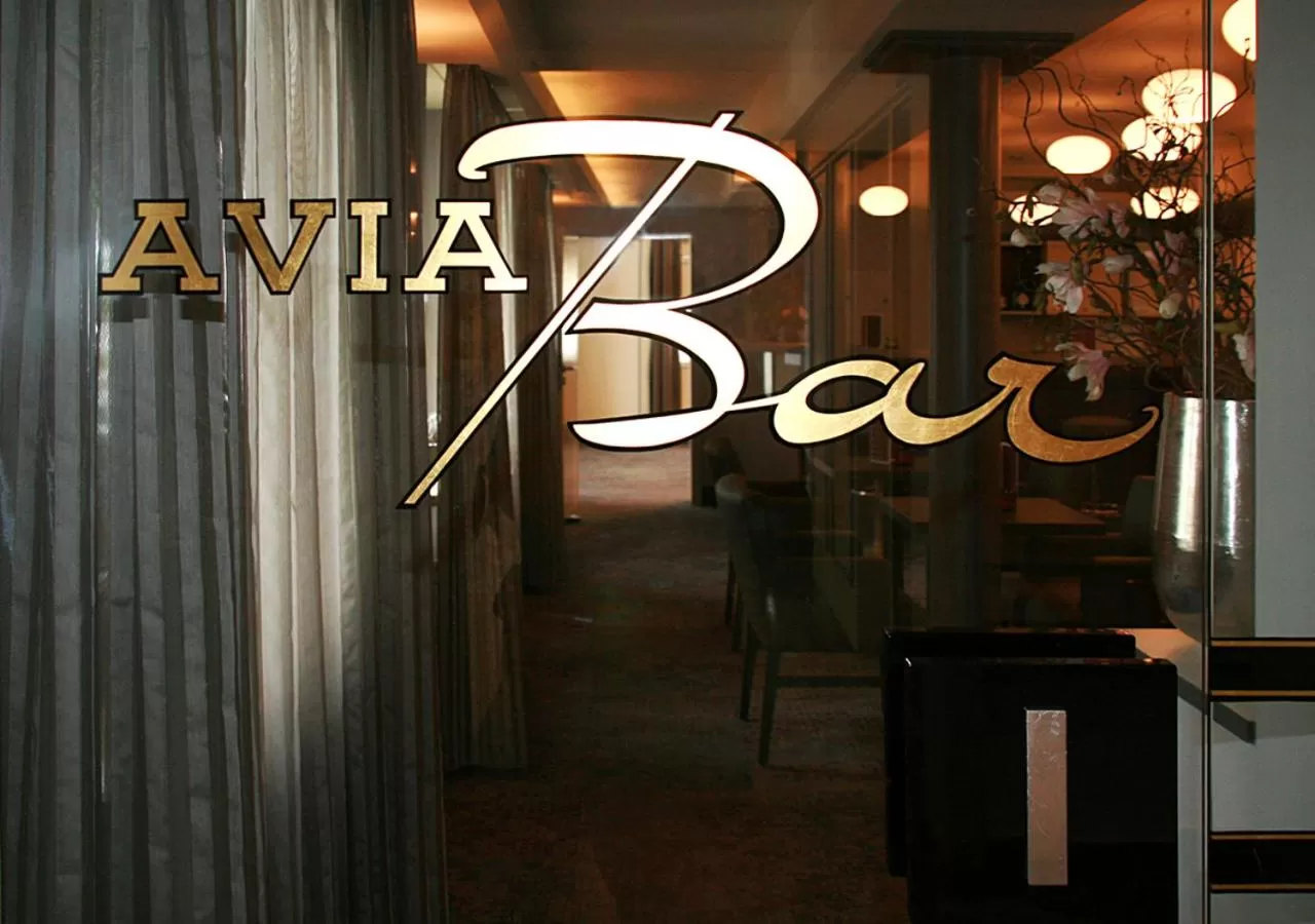 Lounge or bar, Property Logo/Sign in AVIA Hotel