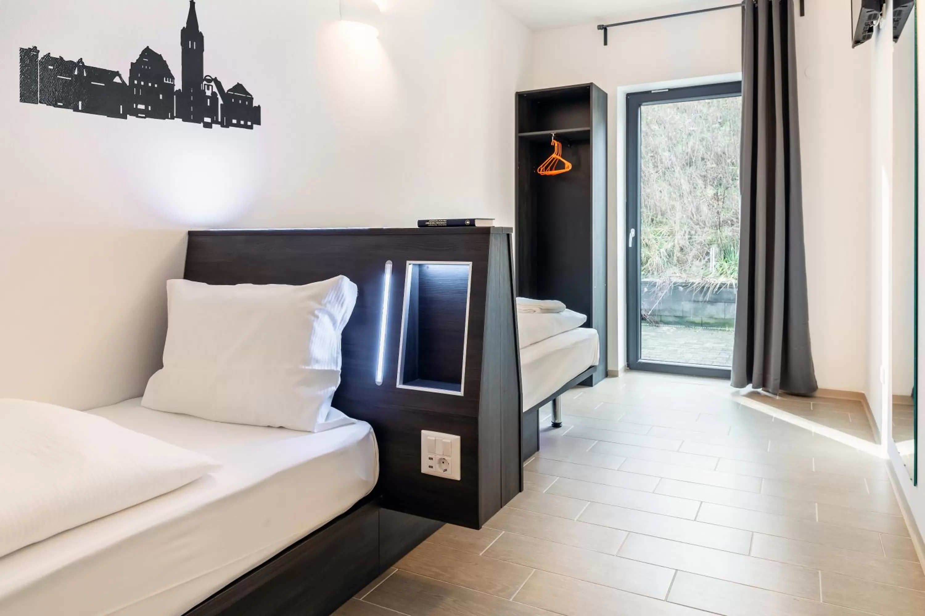 Bed in Augustus Hotel Bernkastel - Comfortable Budget Hotel