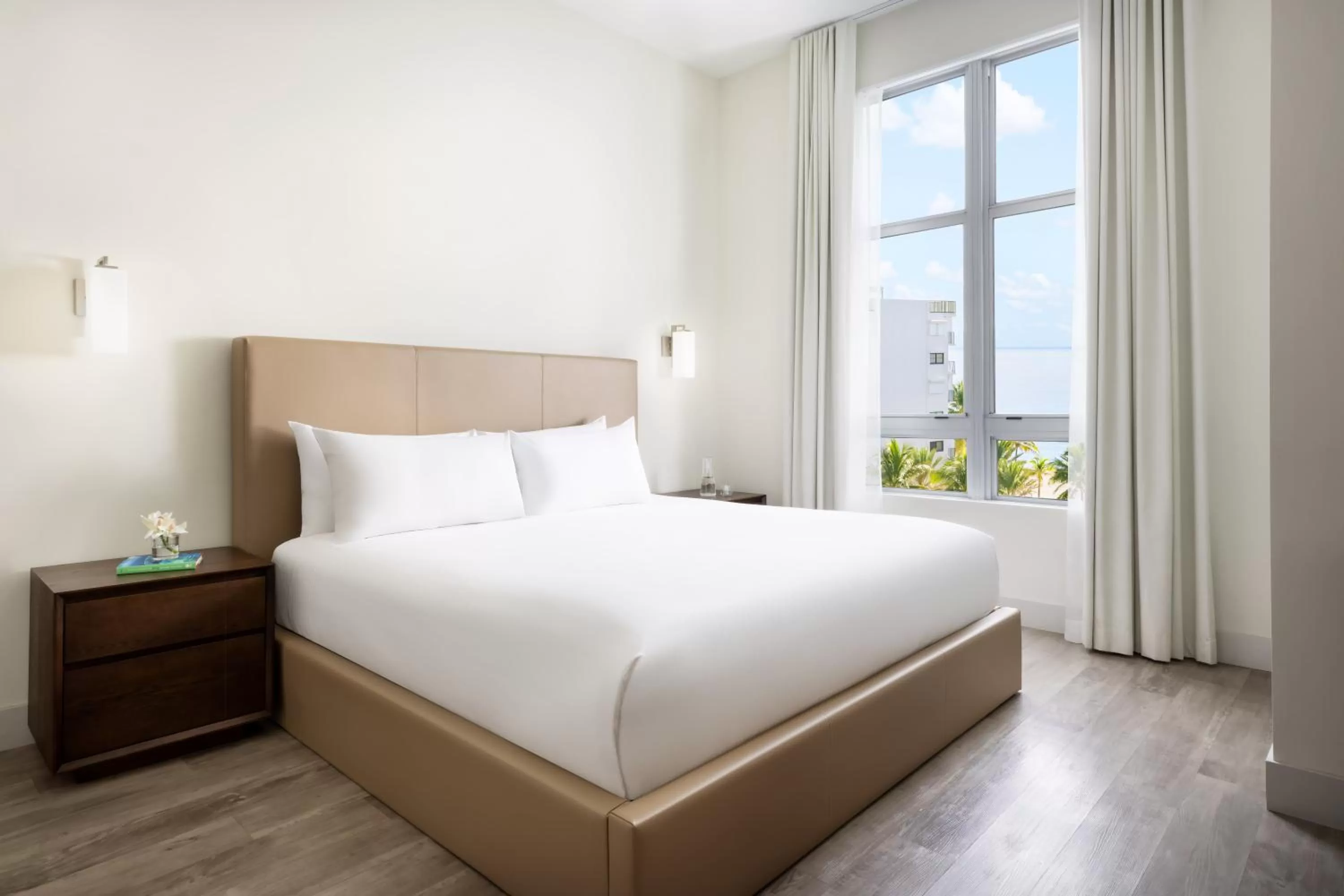 Bed in Costa Hollywood Beach Resort - An All Suite Hotel