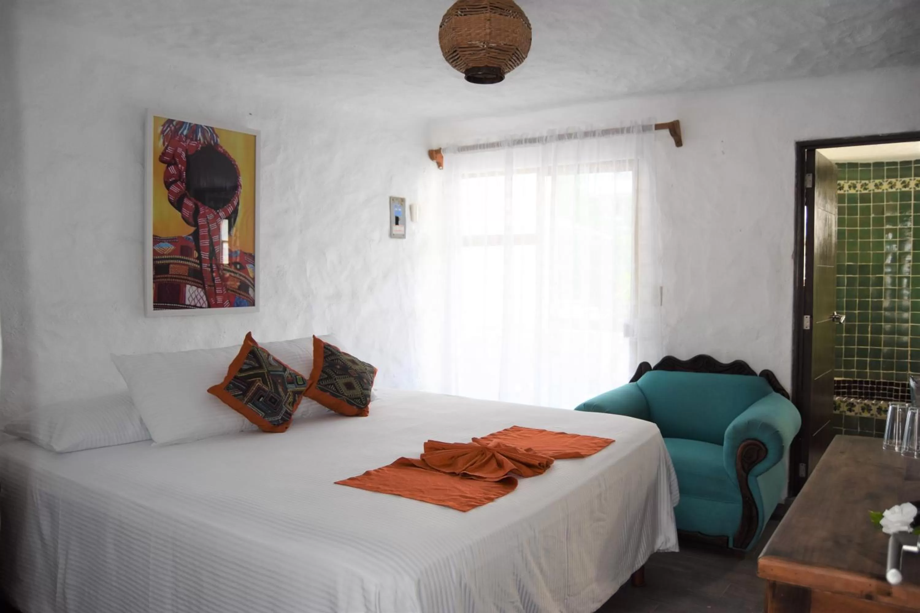 Bed in Petit Hotel Pilitas