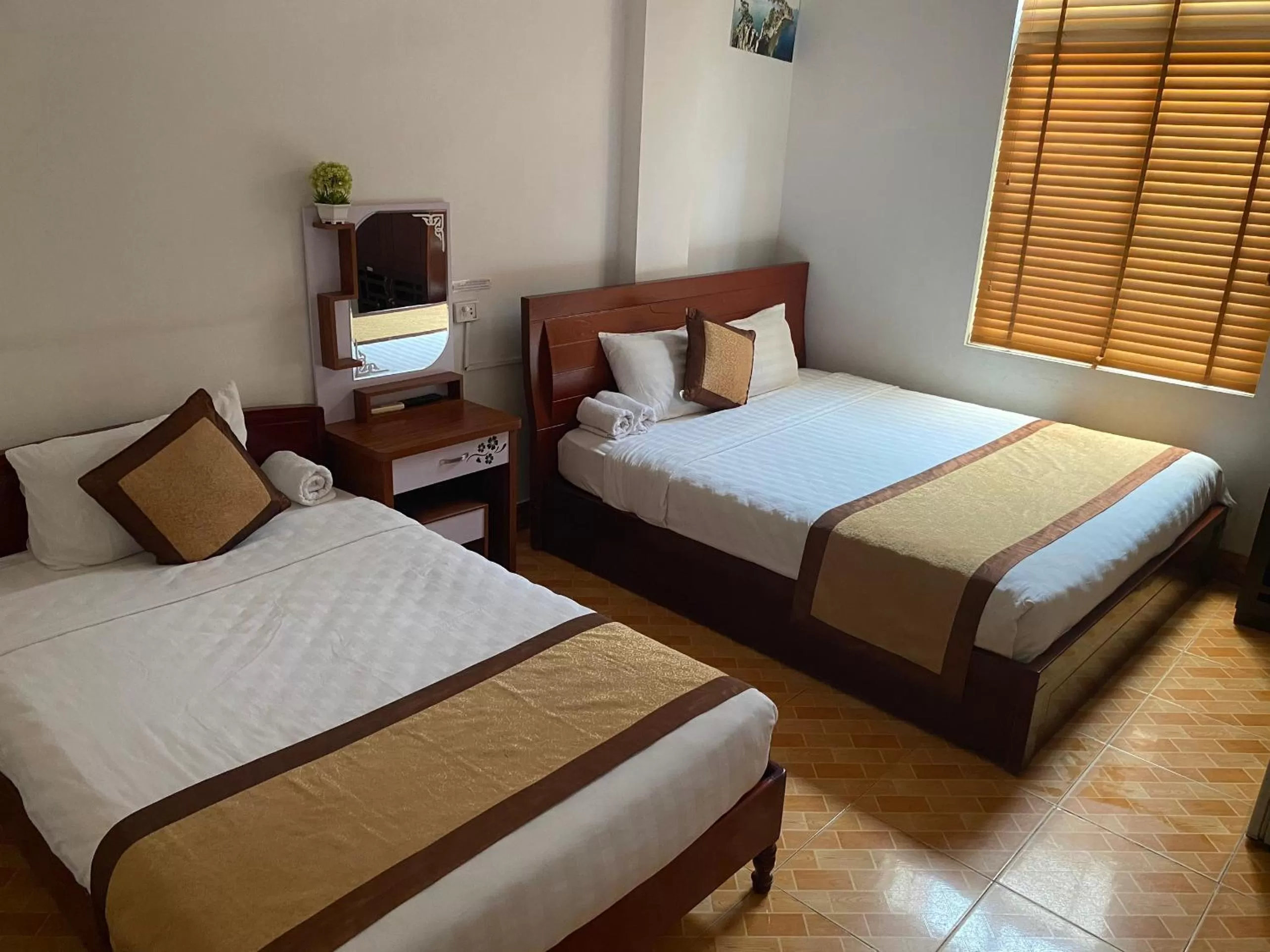 Bed in Alex Ha Long Hotel