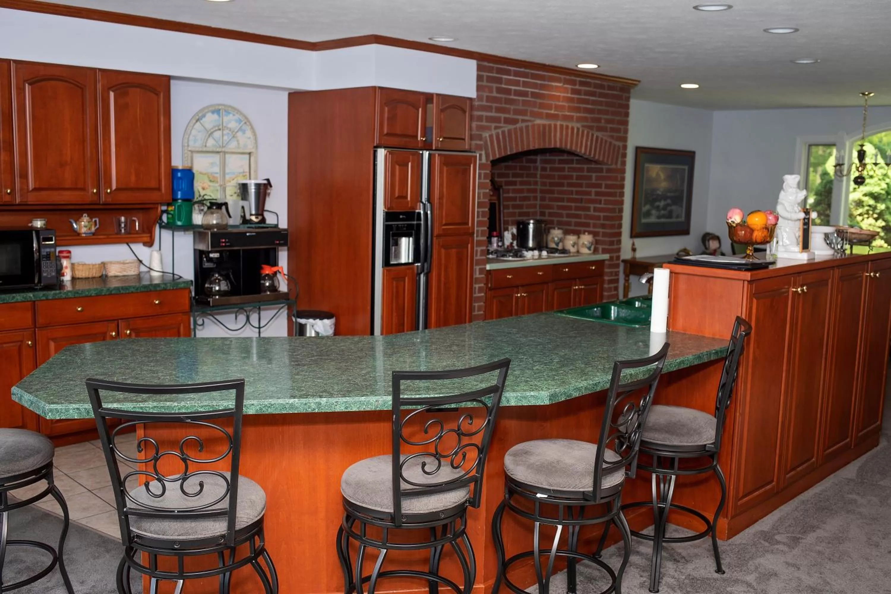 Communal kitchen in Longhouse Manor B&B