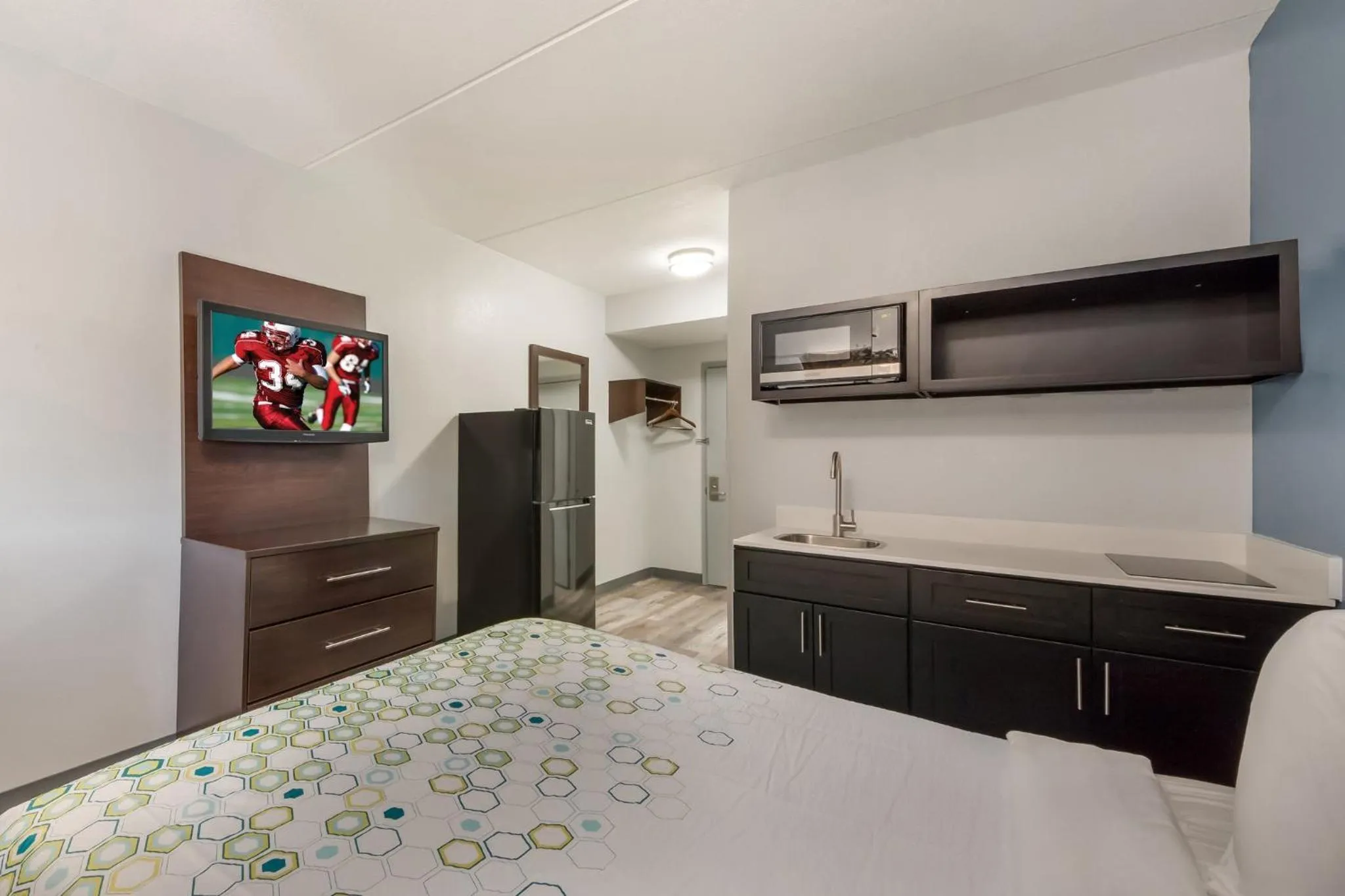 Bedroom, Bed in HomeTowne Studios by Red Roof San Antonio - SeaWorld Northwest