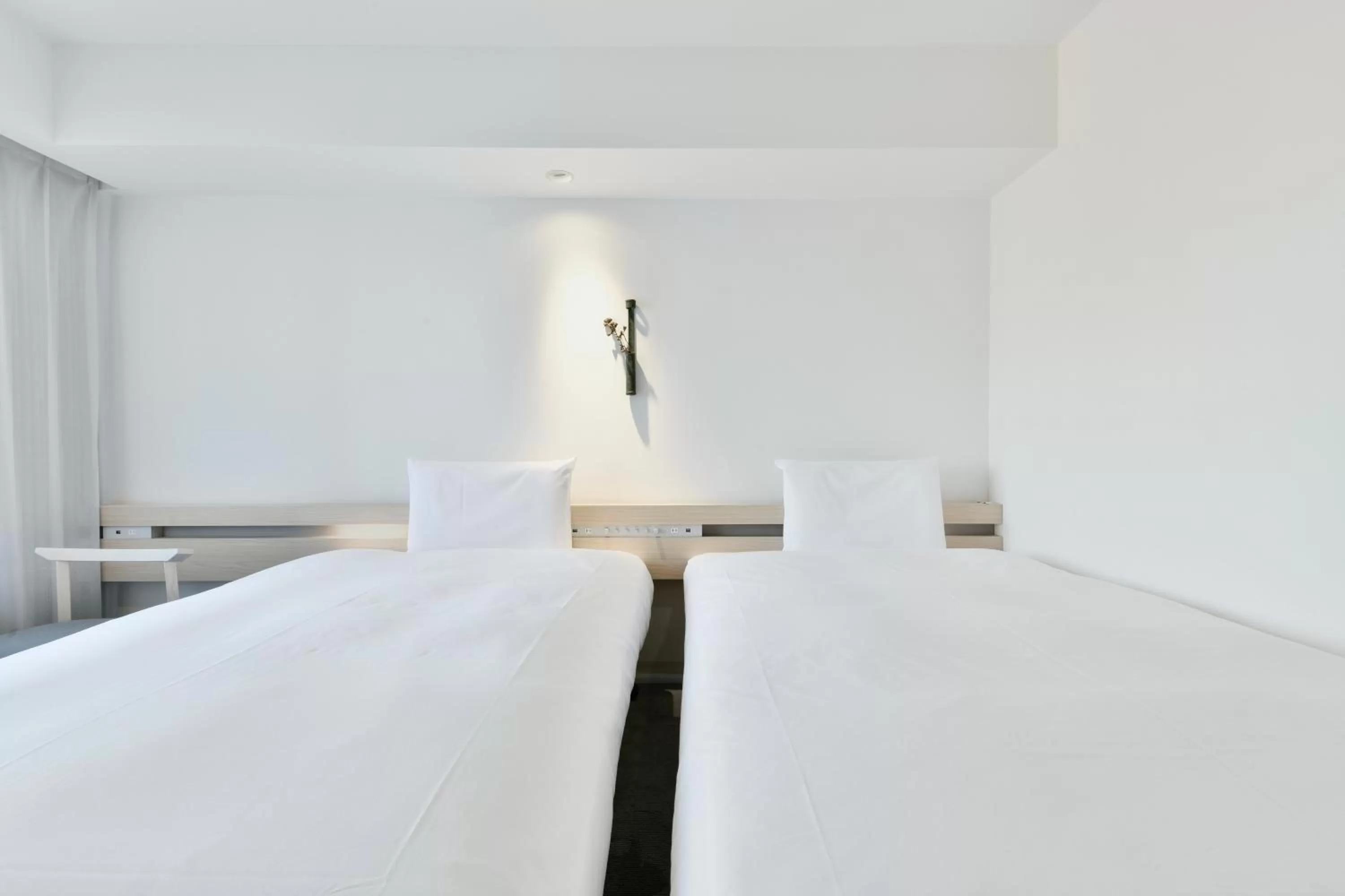Bed in REF Kumamoto by VESSEL HOTELS