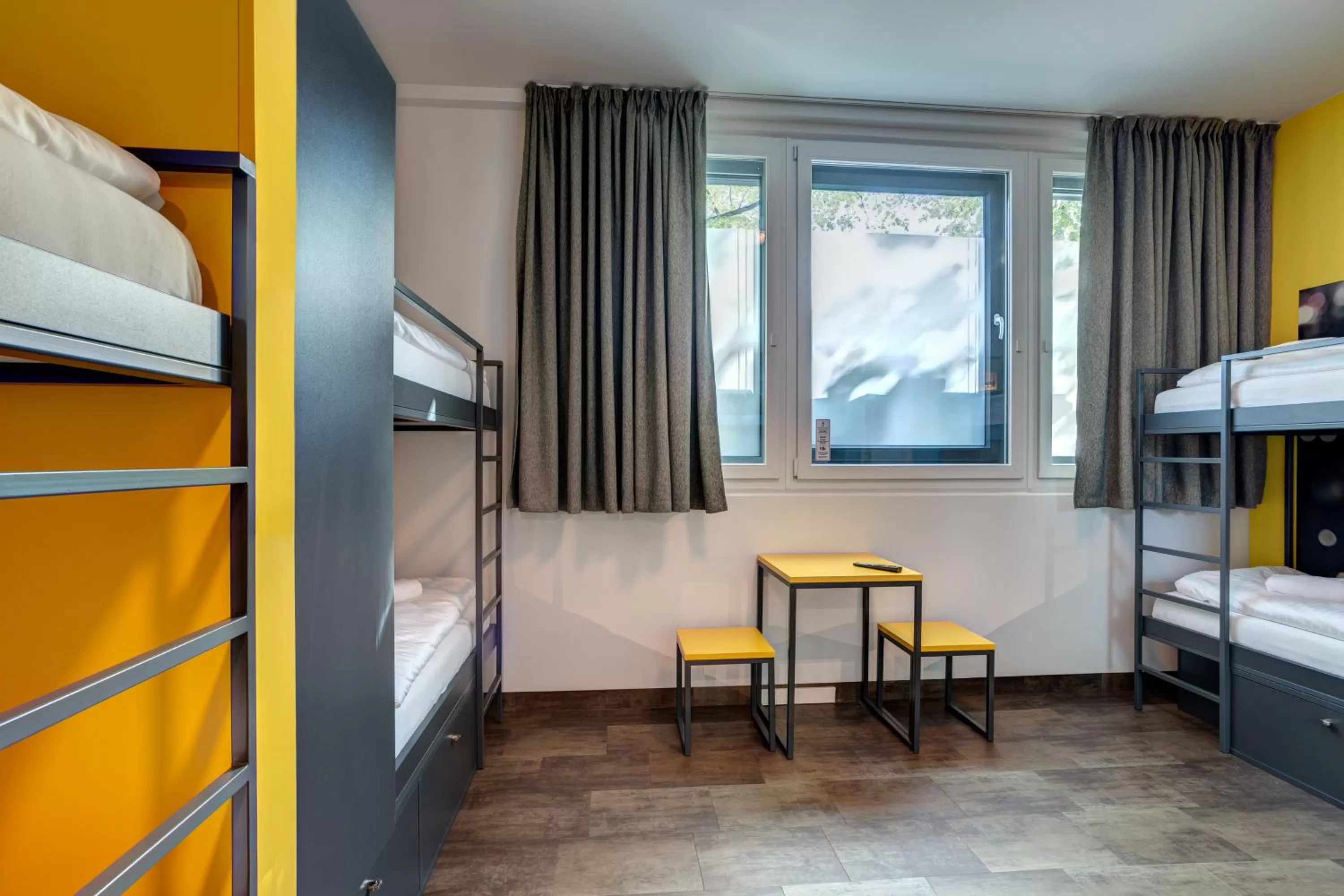 Photo of the whole room, Bed in MEININGER Hotel München Olympiapark