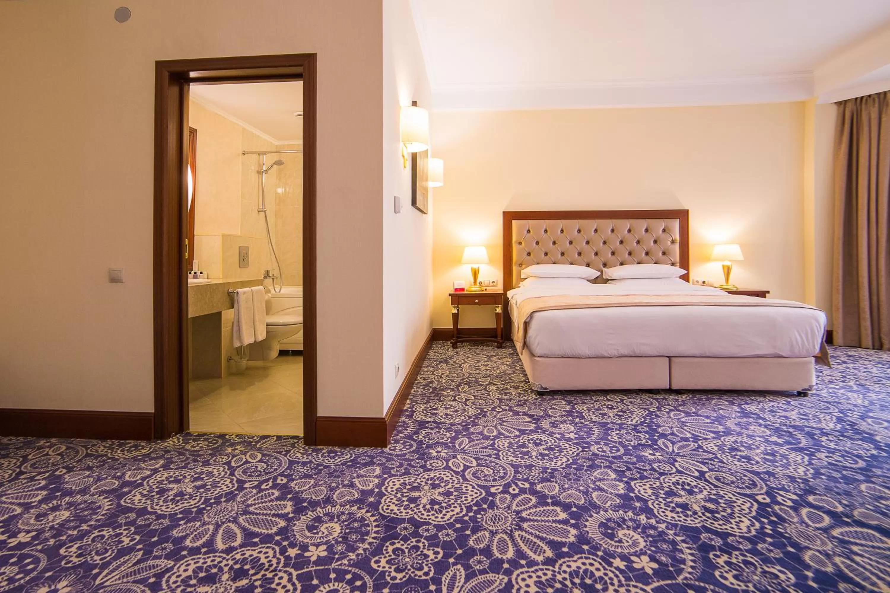 Photo of the whole room, Bed in Ramada by Wyndham Almaty