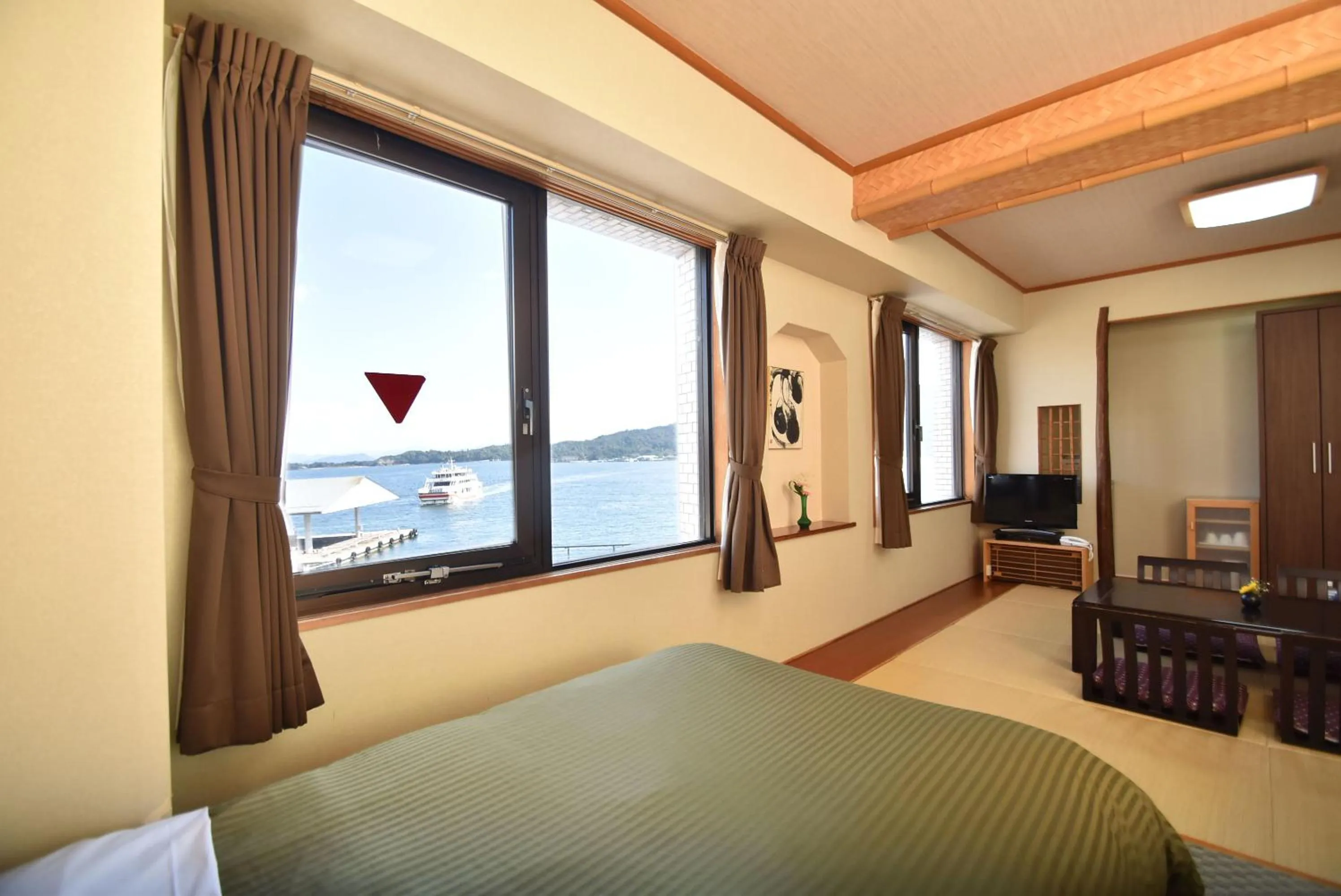 Sea view, Bed in Miyajima Coral Hotel