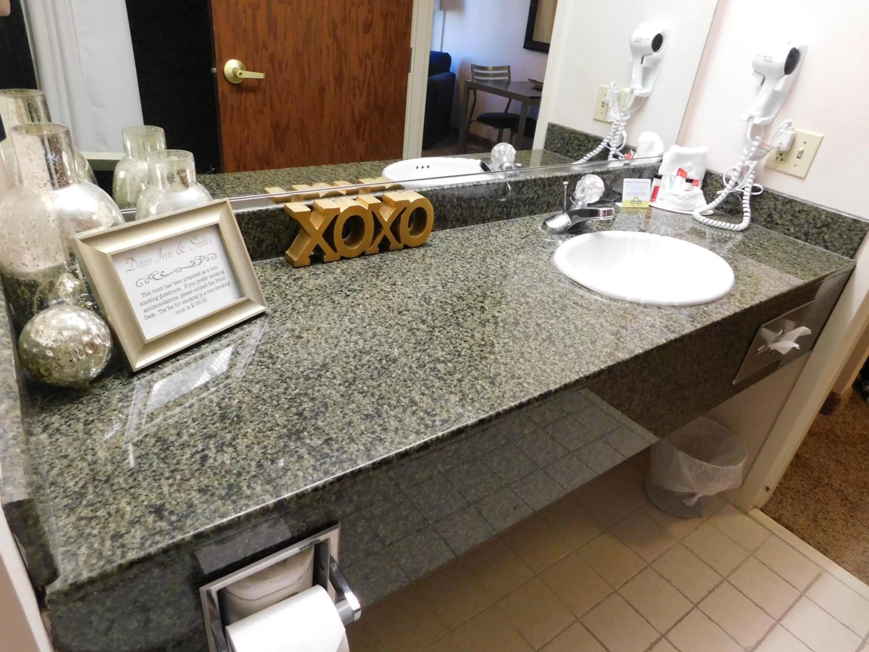 Bathroom in Days Inn & Suites by Wyndham Pocahontas