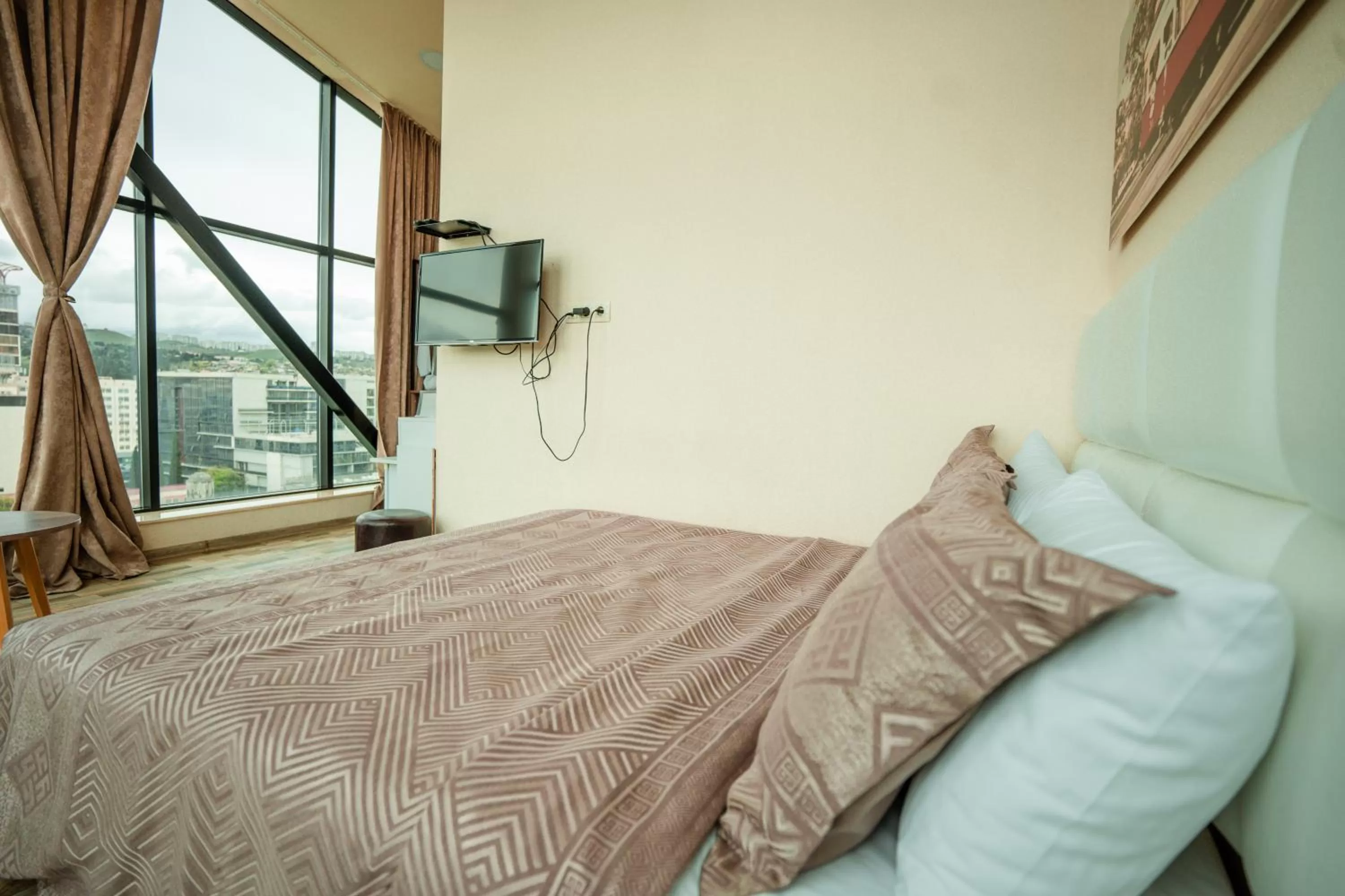 Bed in Hotel Grand View in Tbilisi