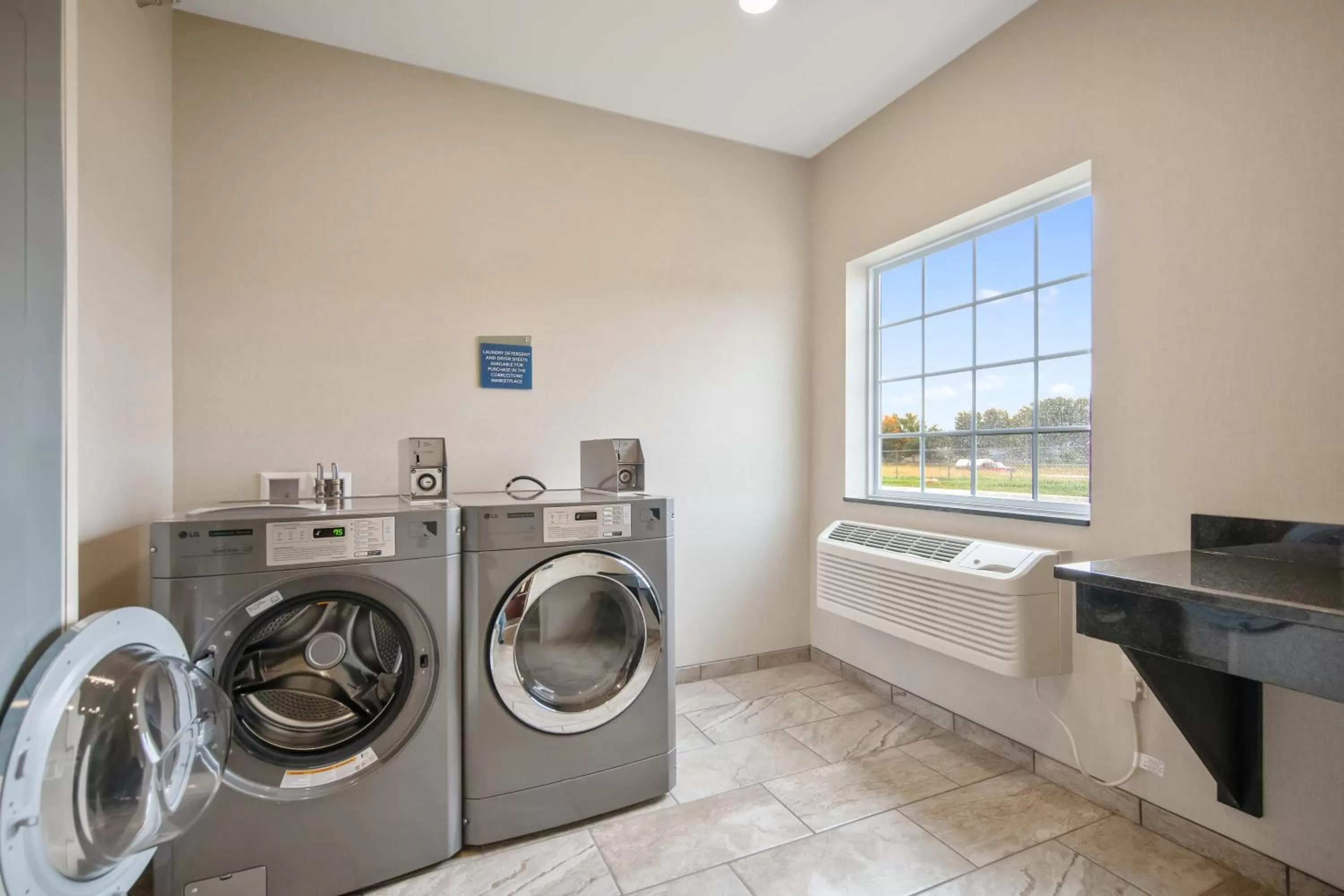 laundry in Cobblestone Hotel & Suites - Austin