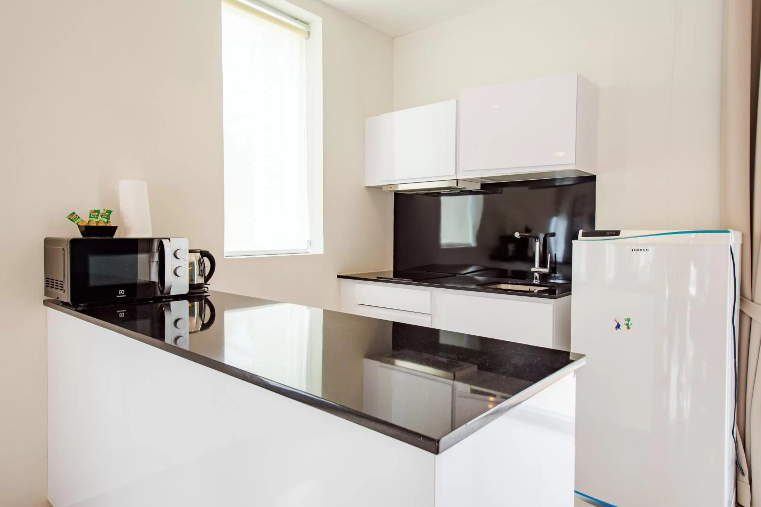 Kitchen or kitchenette in The Beach Village Resort