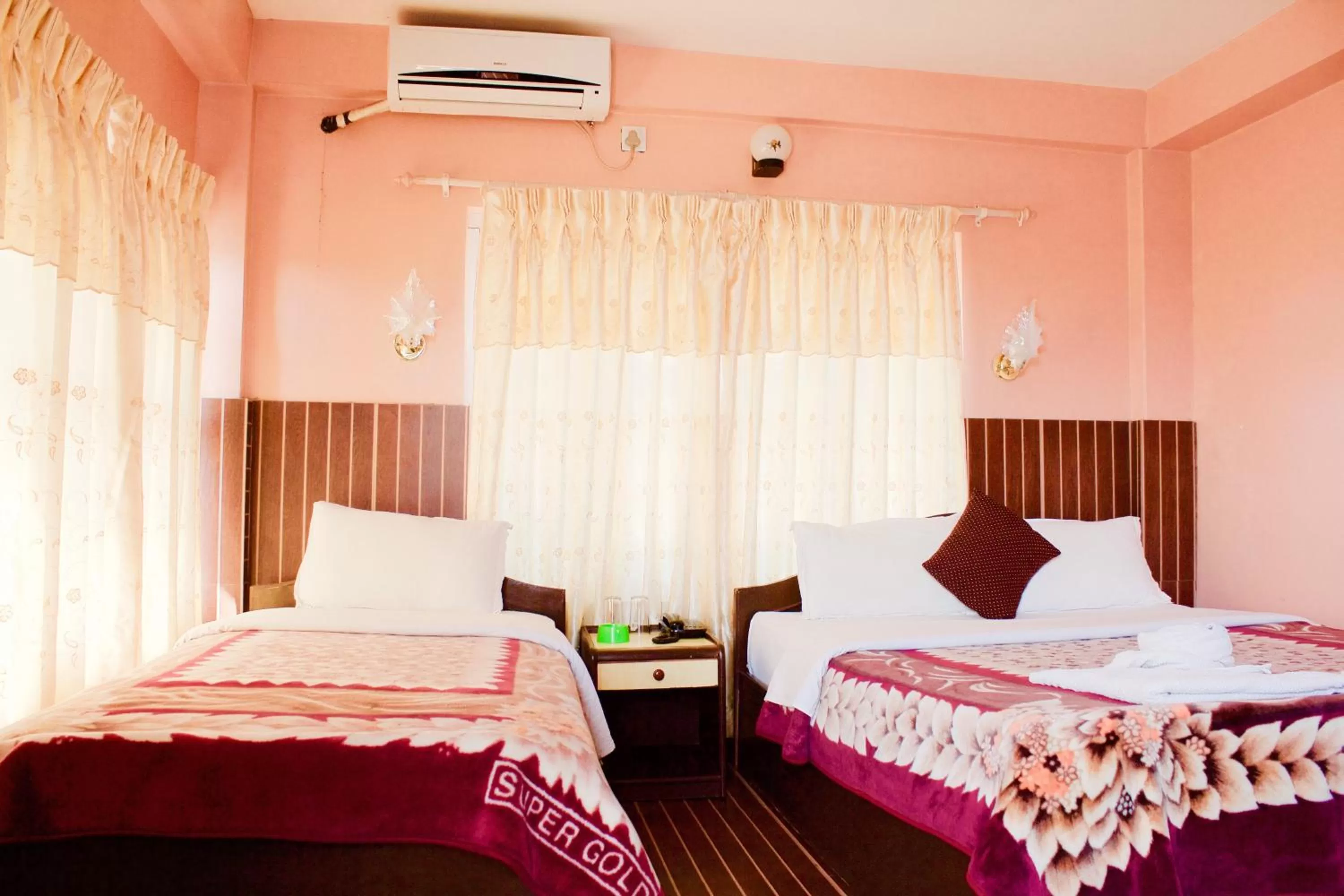 Bed in Hotel Himalayan Inn