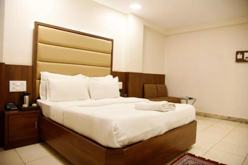 Bed in Hotel Sai Yatri