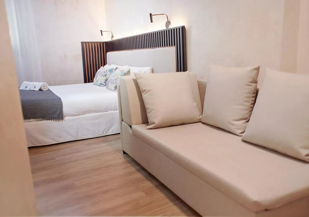 Bed in ISA Sevilla Suites