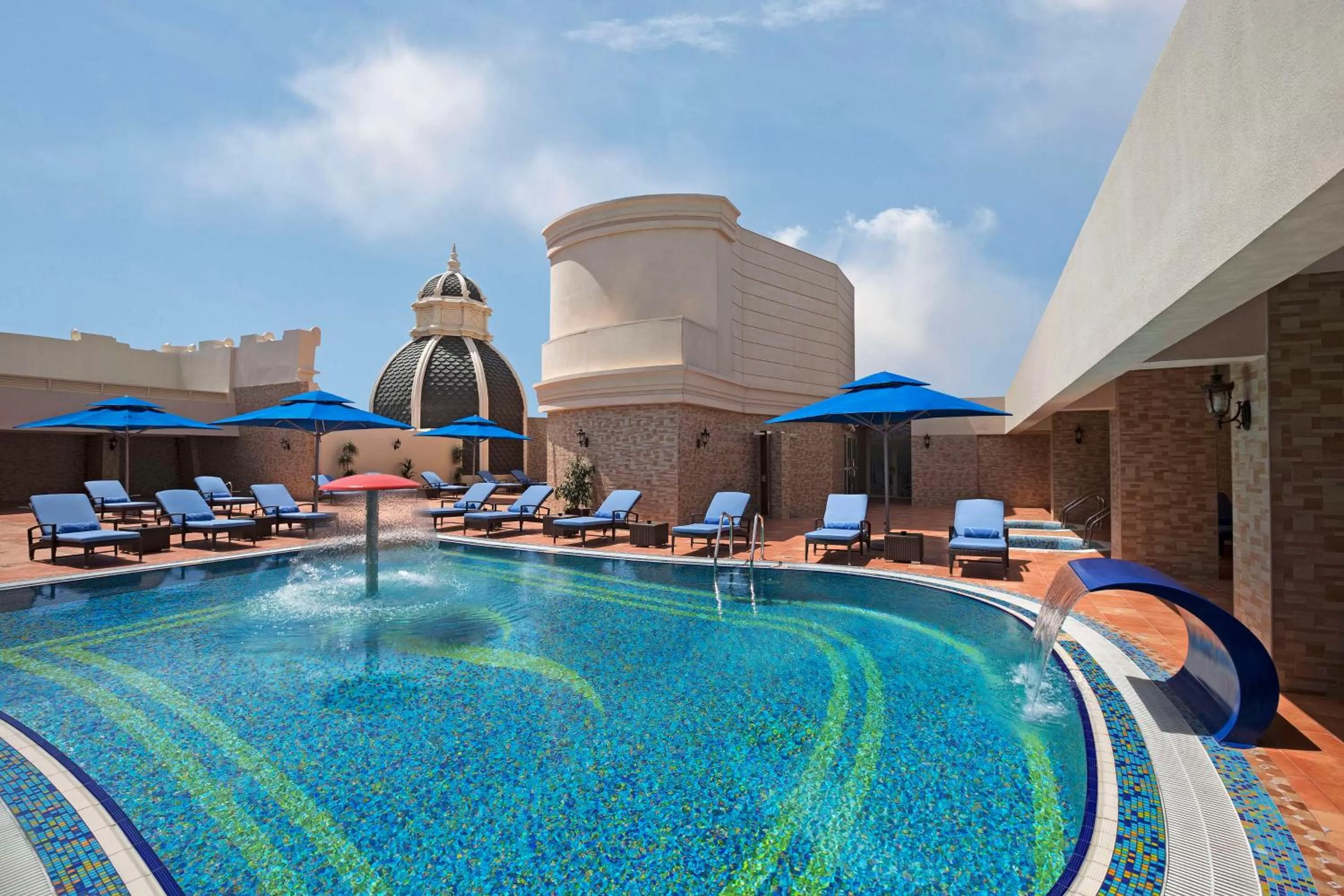 Pool view in Royal Rose Abu Dhabi, a Curio Collection by Hilton Affiliated Hotel