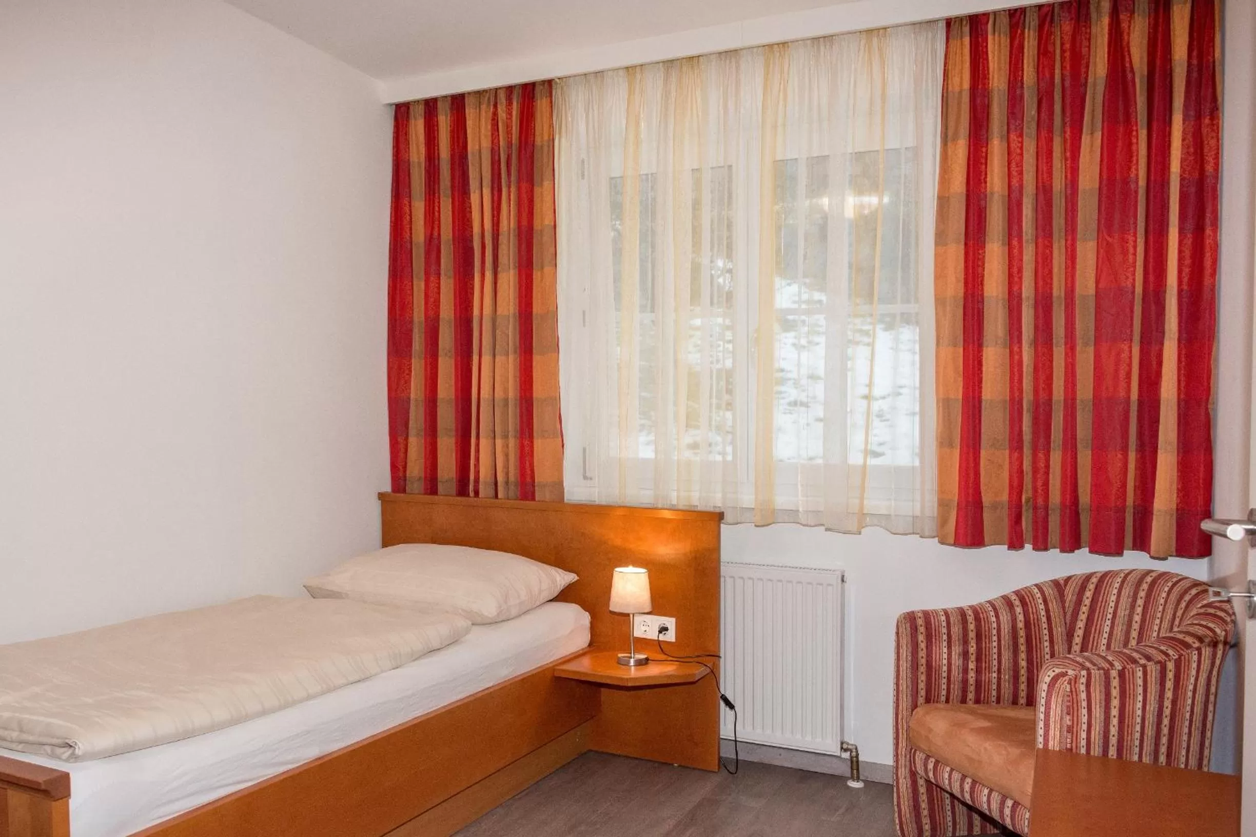 Photo of the whole room, Bed in Landhotel Post Ebensee am Traunsee ***S