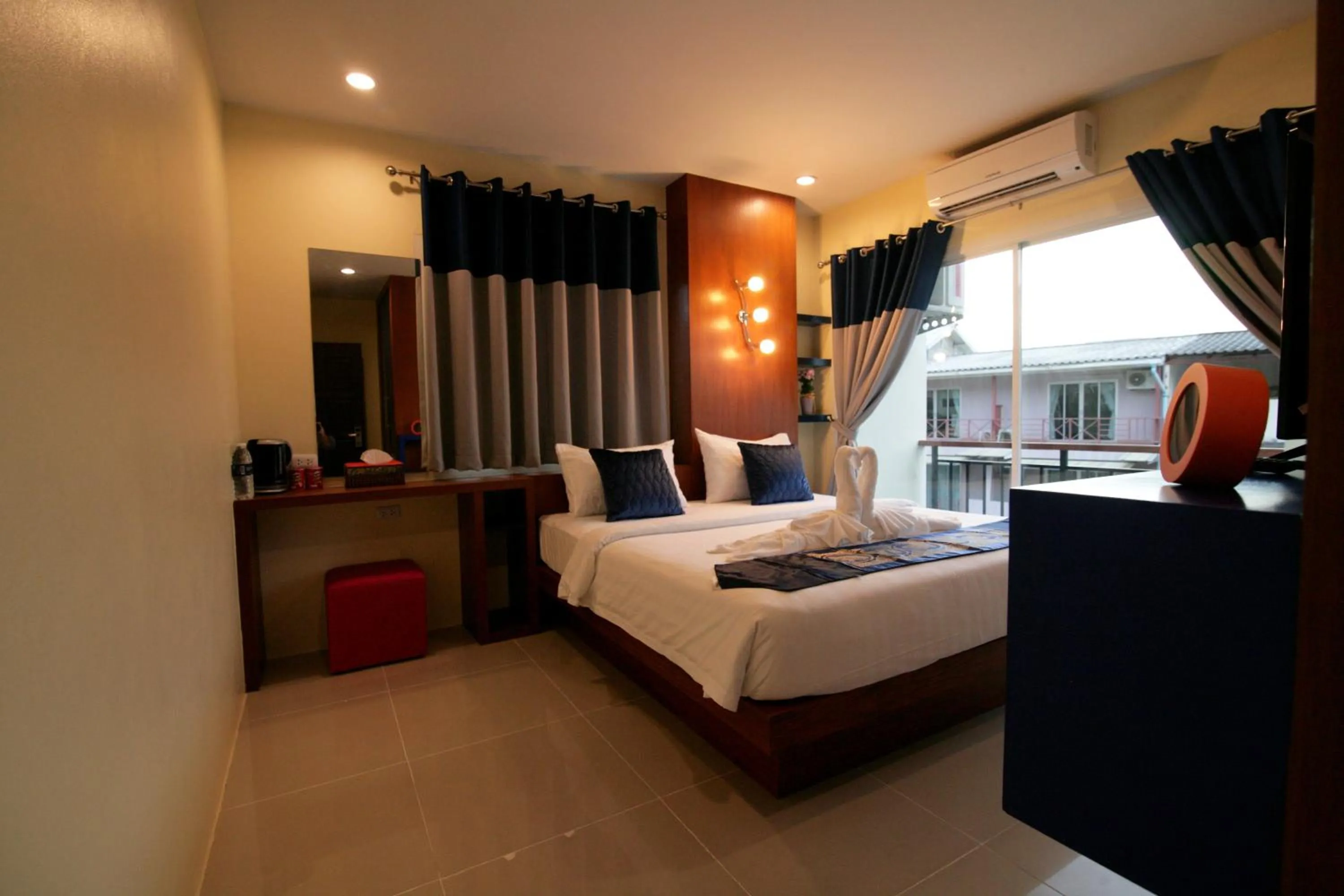 Bed in Calypso Patong Hotel
