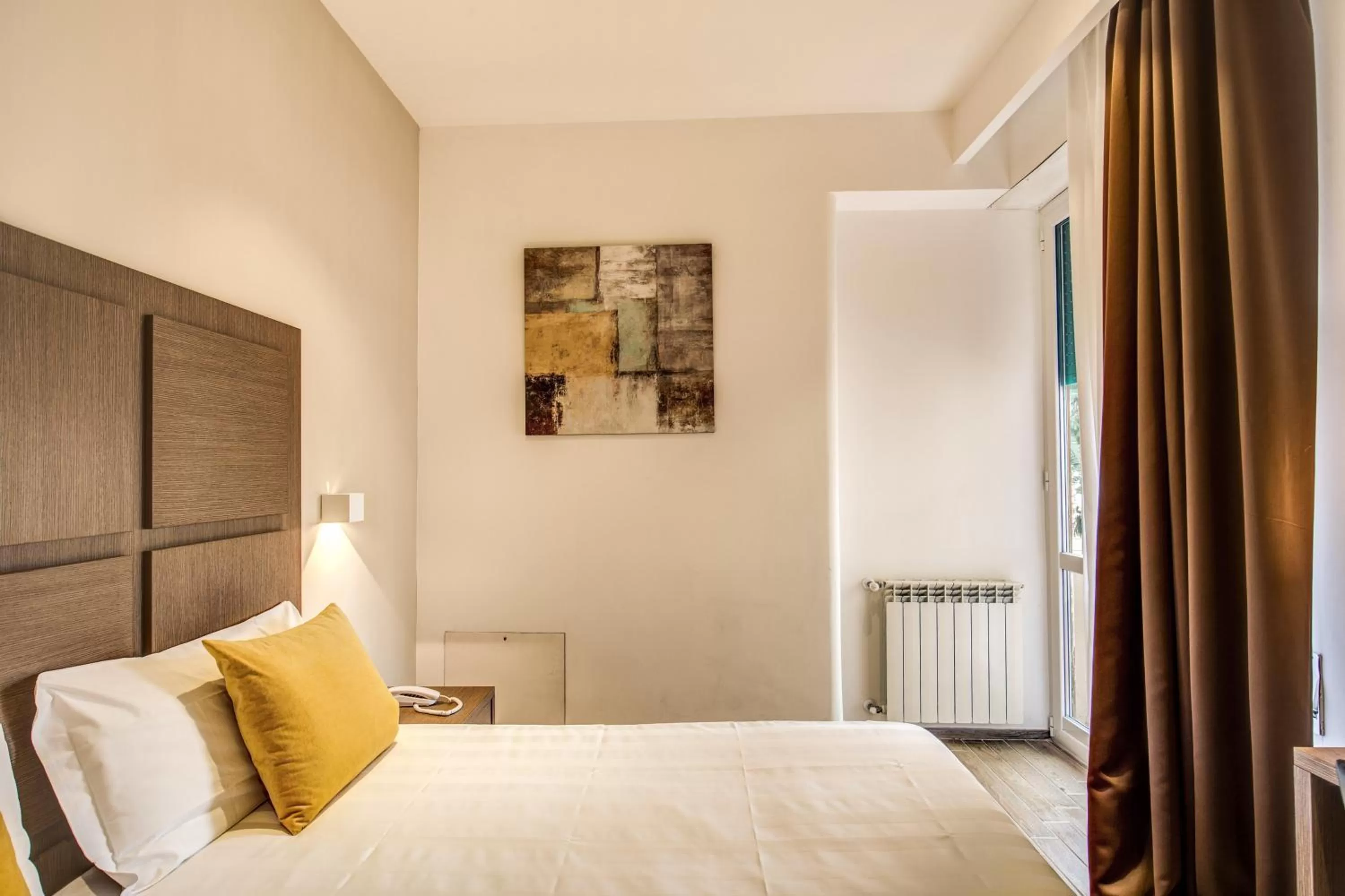 Bed in Rome Garden Hotel