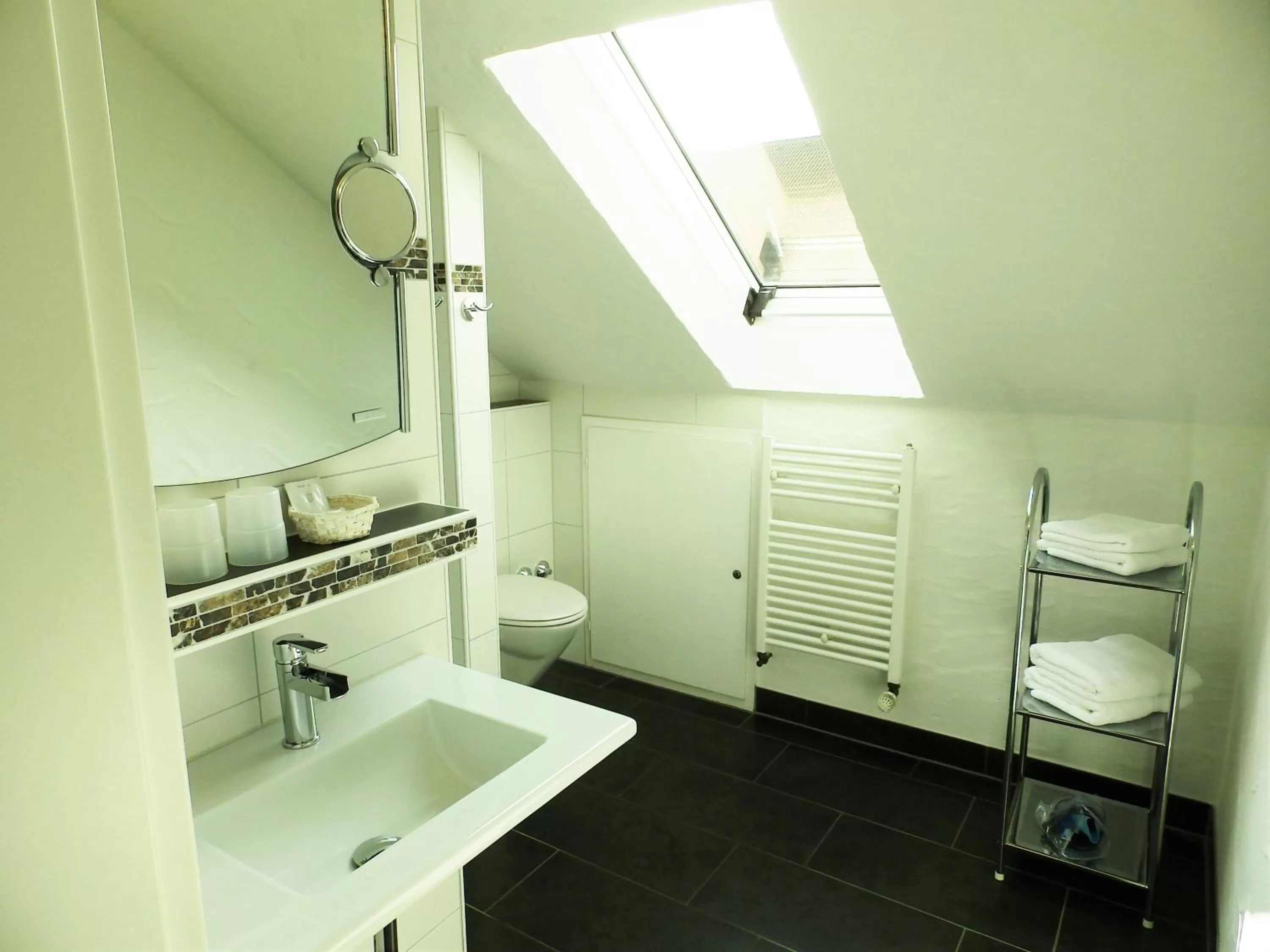 Bathroom in H41 Inn Hotel Garni Freiburg