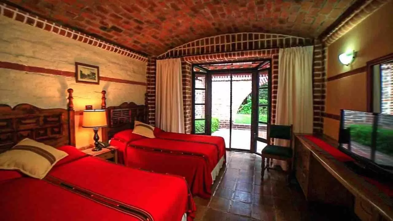 Bed in Hotel San Buenaventura de Atitlán