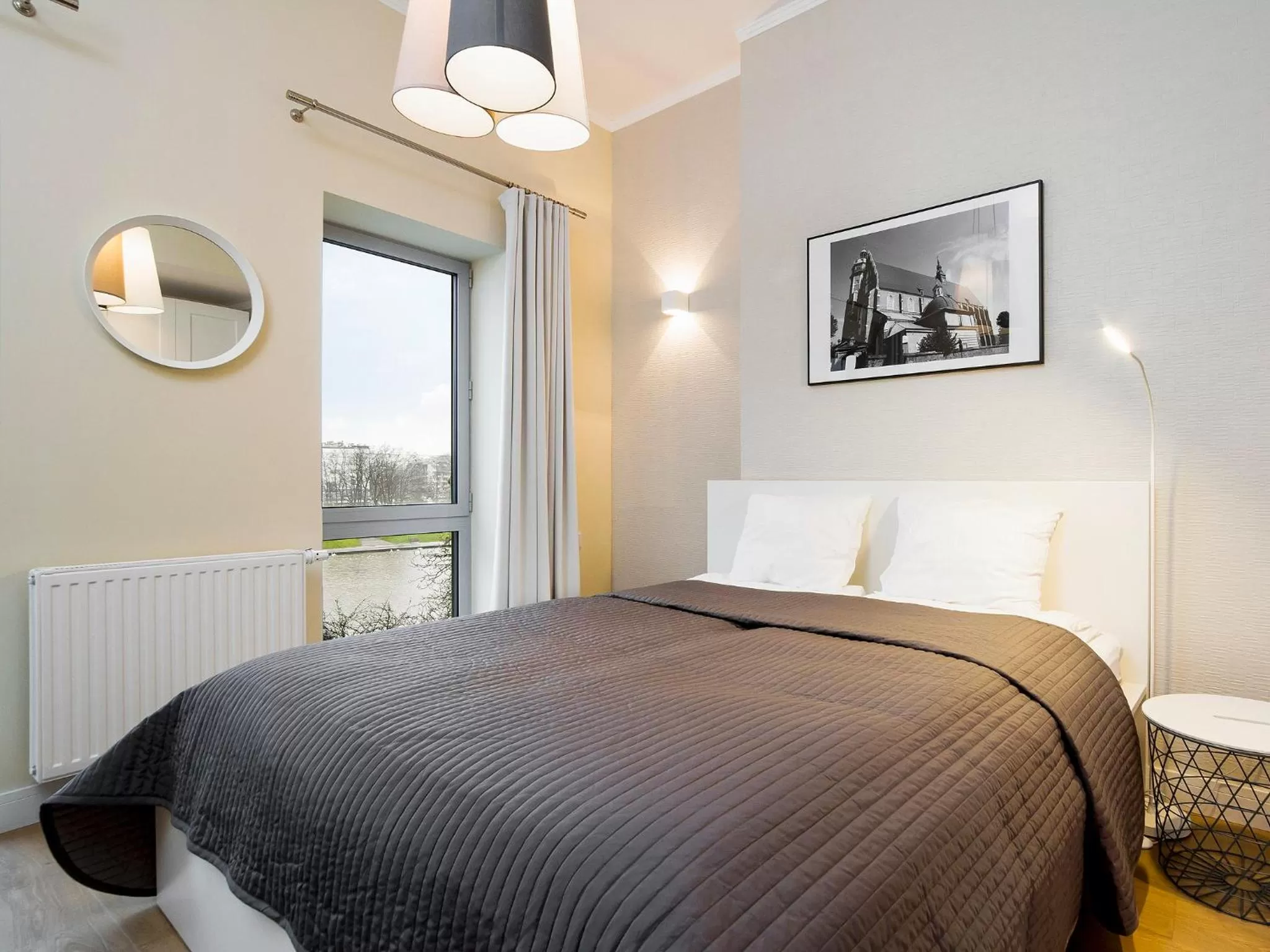 Bed in Riverside Aparthotel Cracow