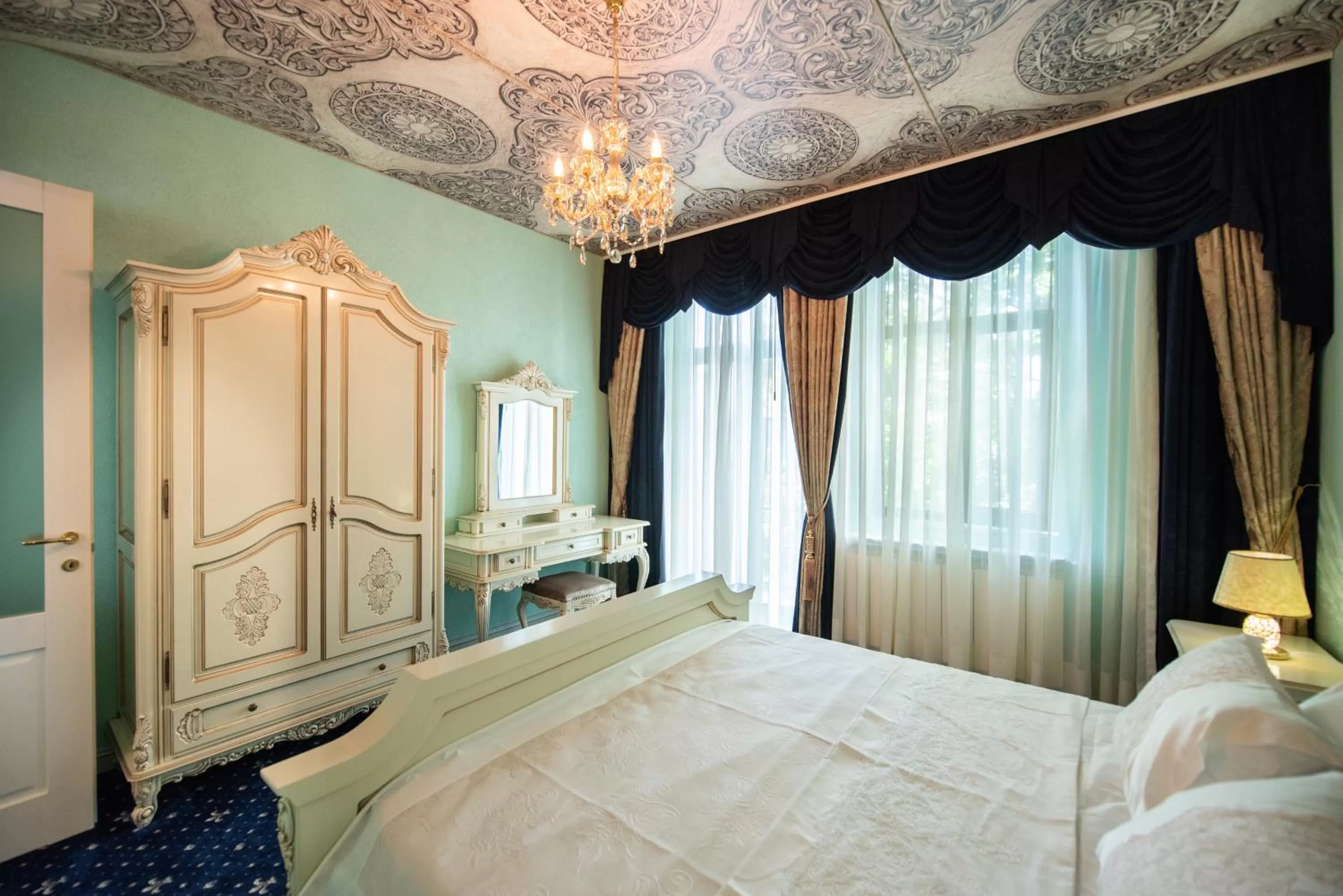 Photo of the whole room, Bed in JMR Royal -Luxury Rooms & Private Sauna