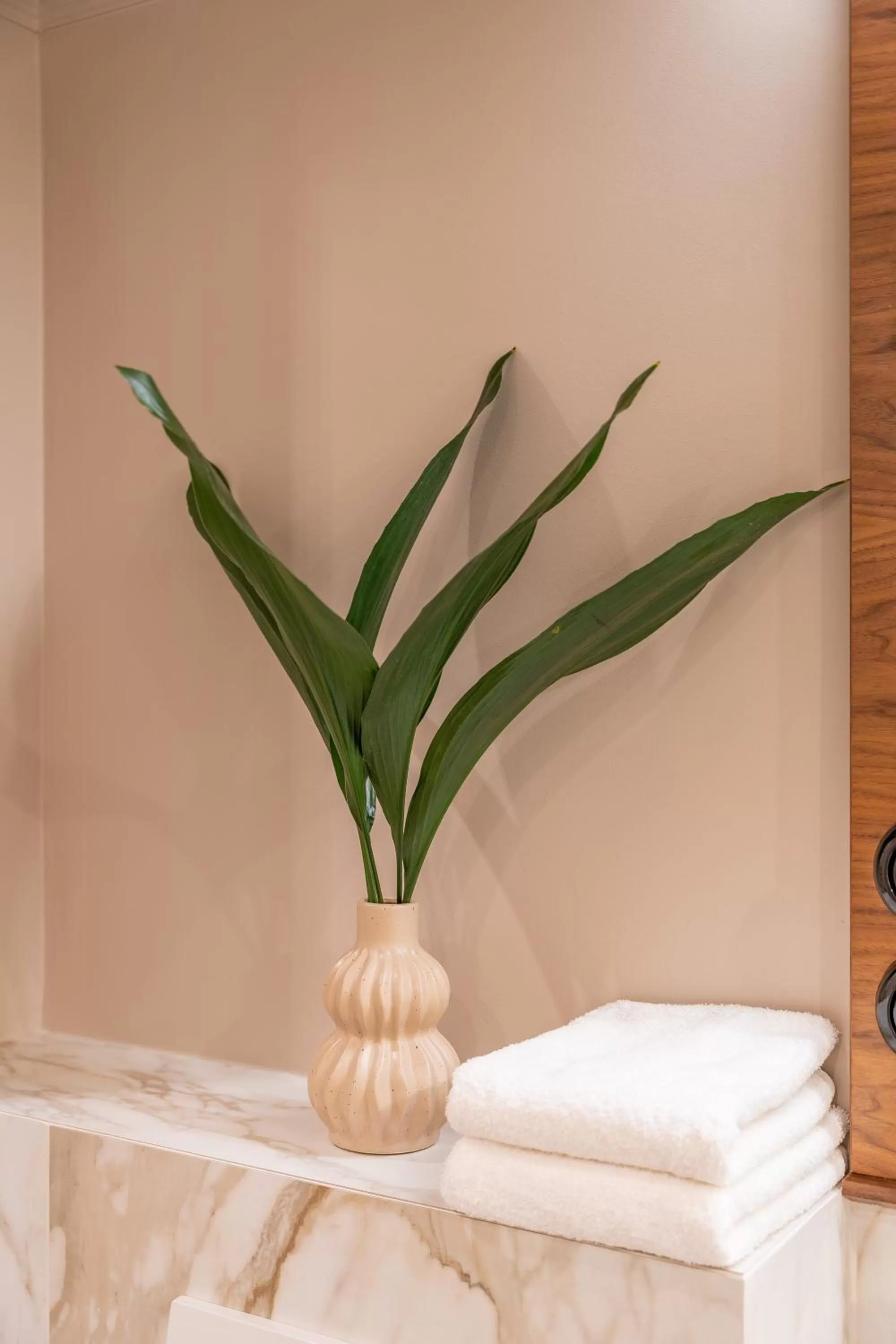 Bathroom in Queen's Court Hotel & Residence