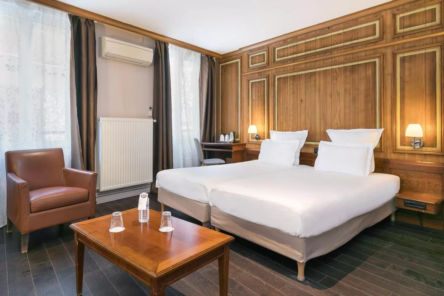 Bed in Hôtel de l'Europe by HappyCulture