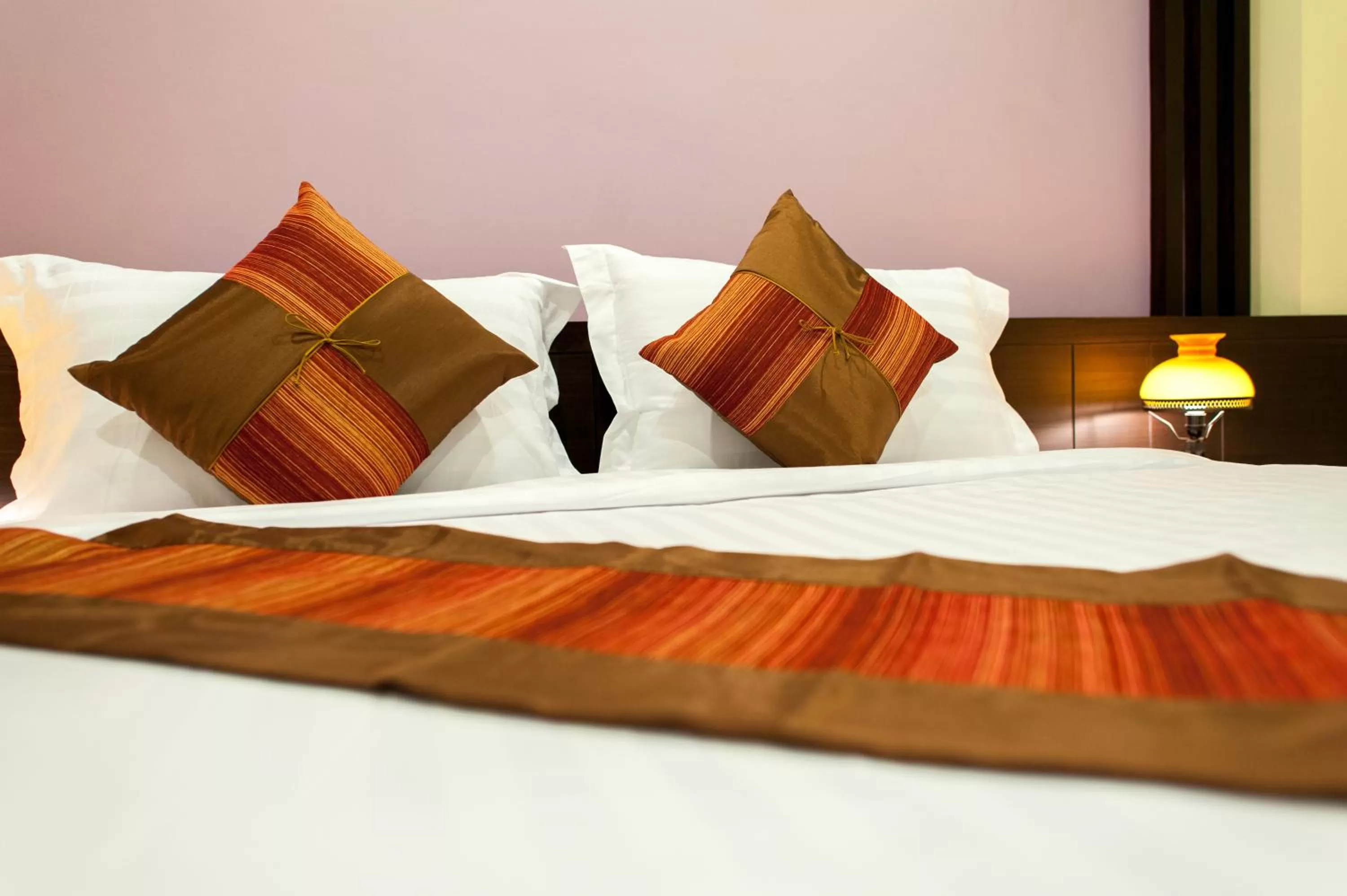 Bed in Tara Place Hotel Bangkok