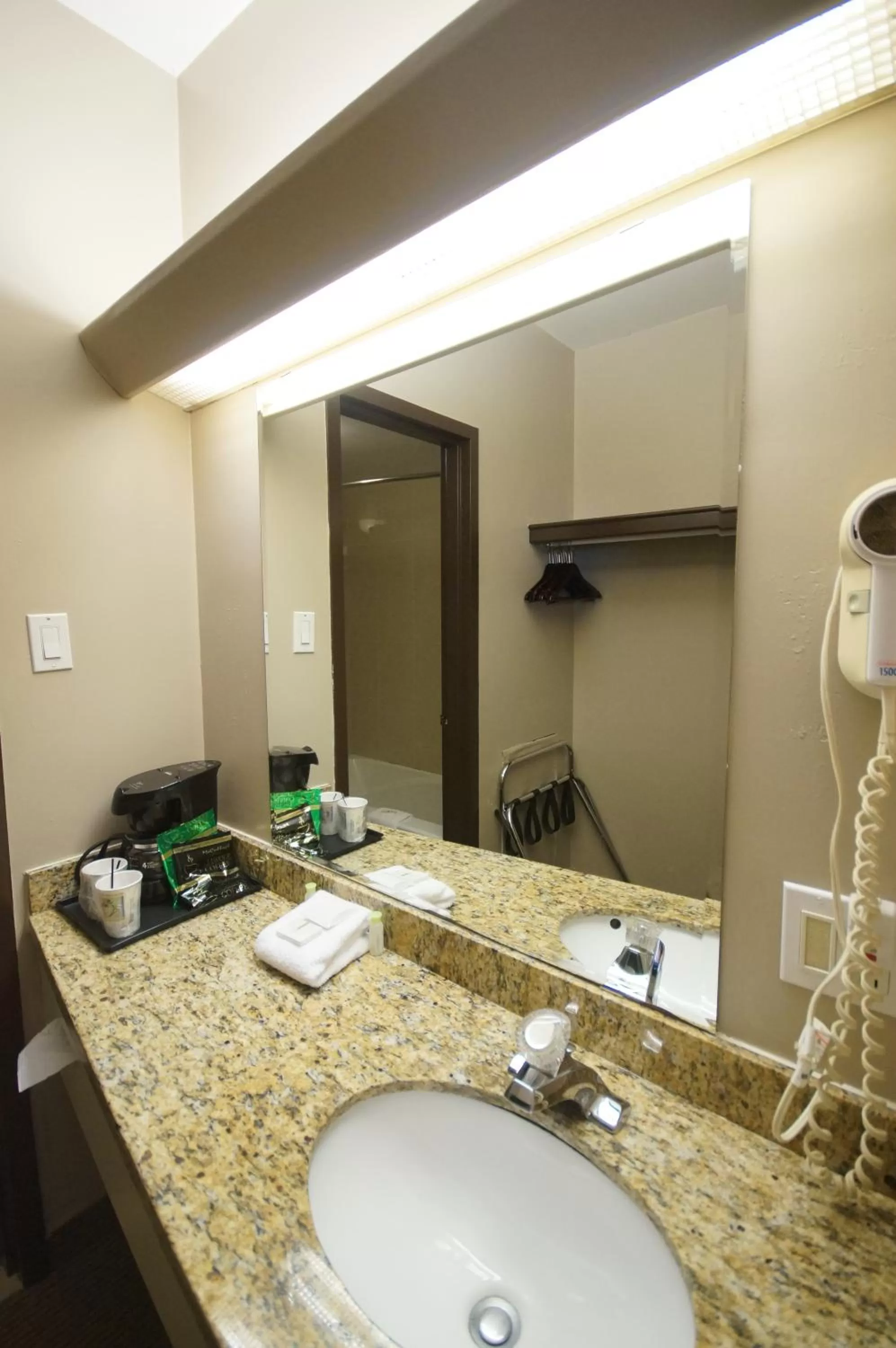 Bathroom in Days Inn by Wyndham Montreal Airport Conference Centre