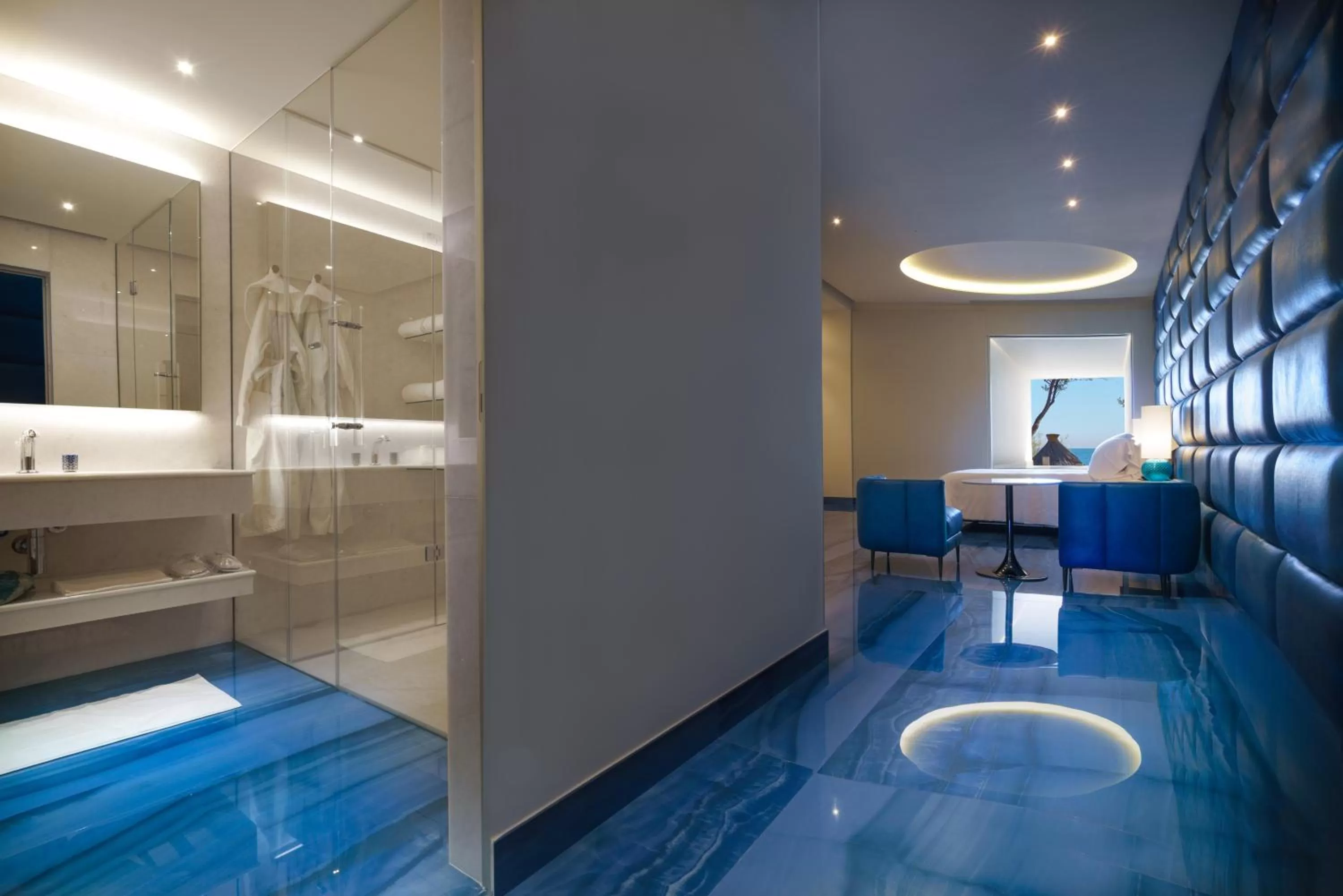 Bedroom in Grotta Palazzese Beach Hotel