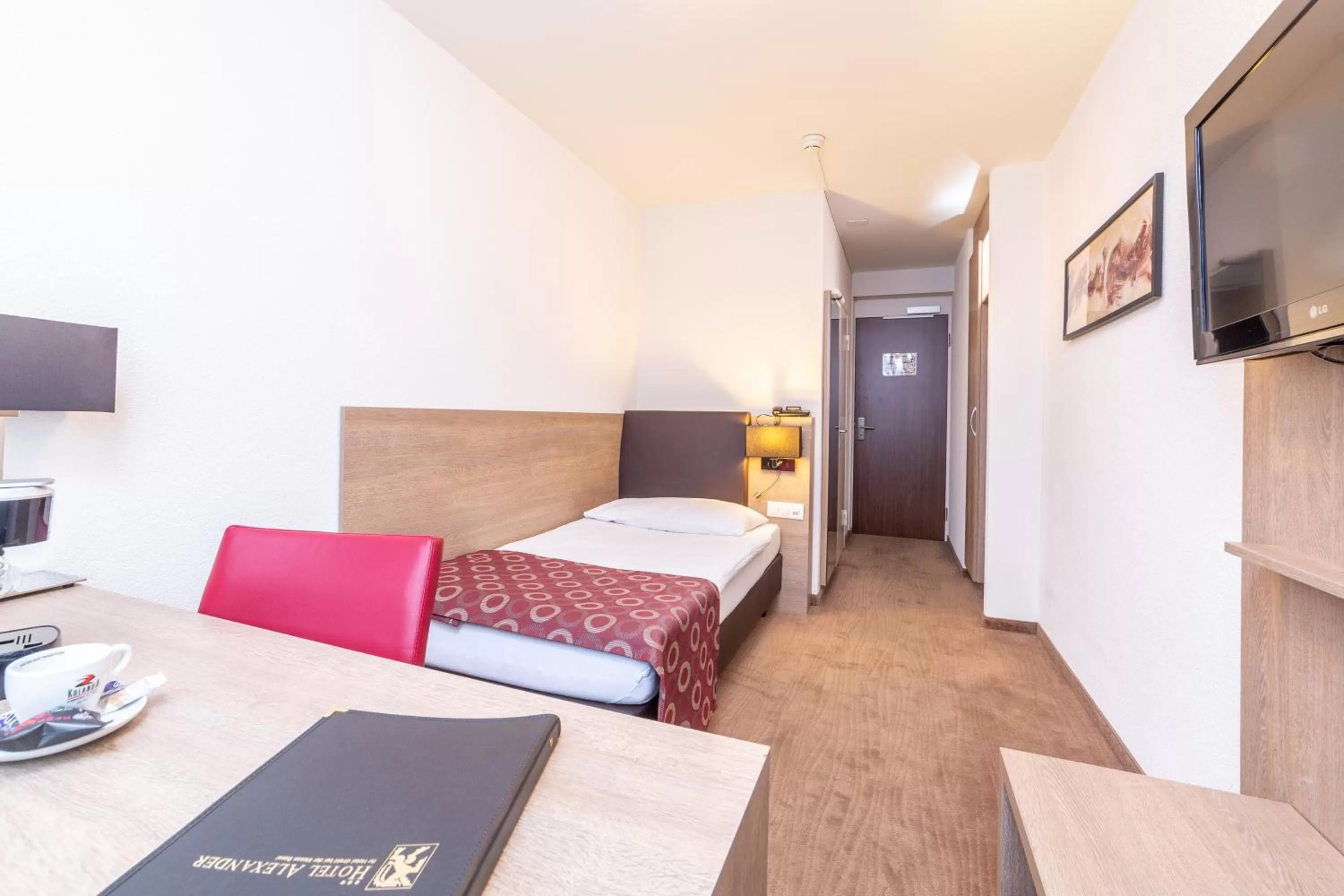 Bed in Hotel Alexander