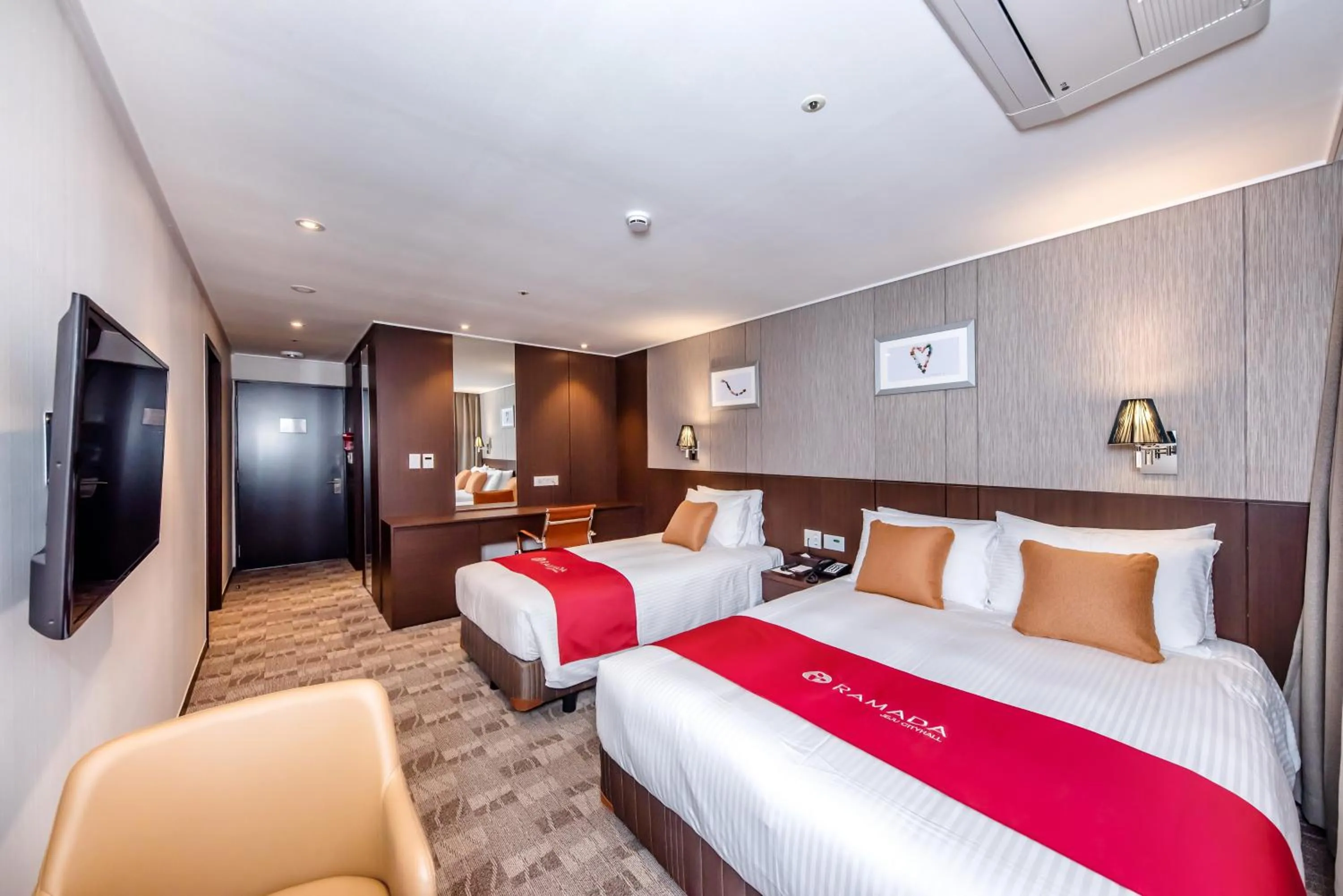 Bed in Ramada by Wyndham Jeju City Hall