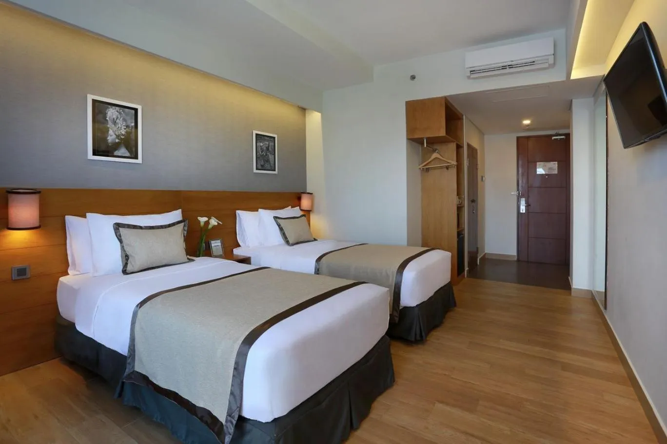 Bedroom, Bed in Golden Tulip Essential Denpasar Hotel