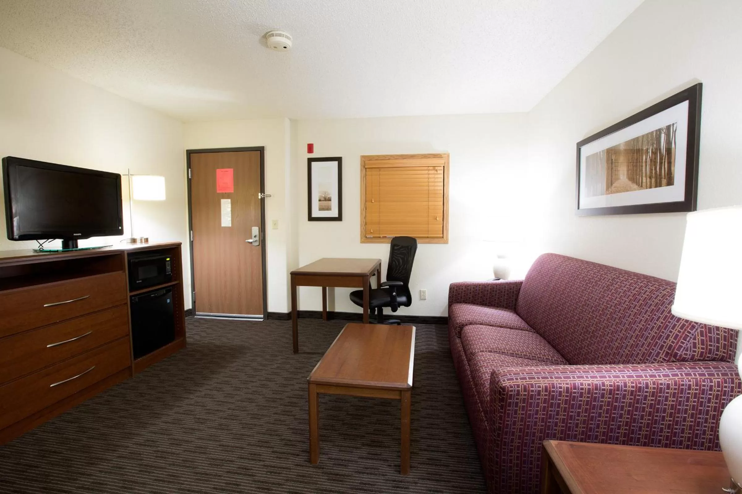 Living room in AmericInn by Wyndham Medora