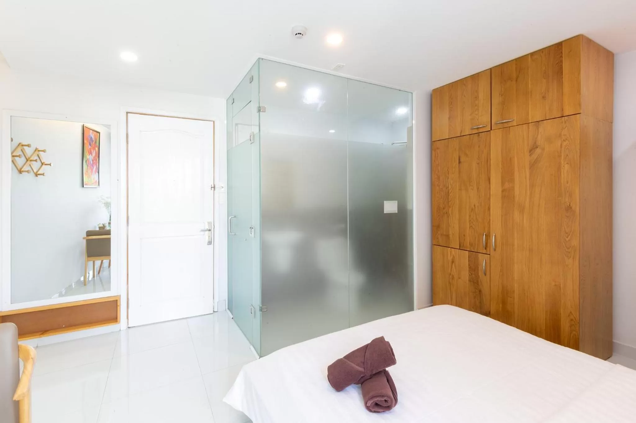 Bathroom, Bed in HOSTIE SAIGON [WANDERLUST Home]