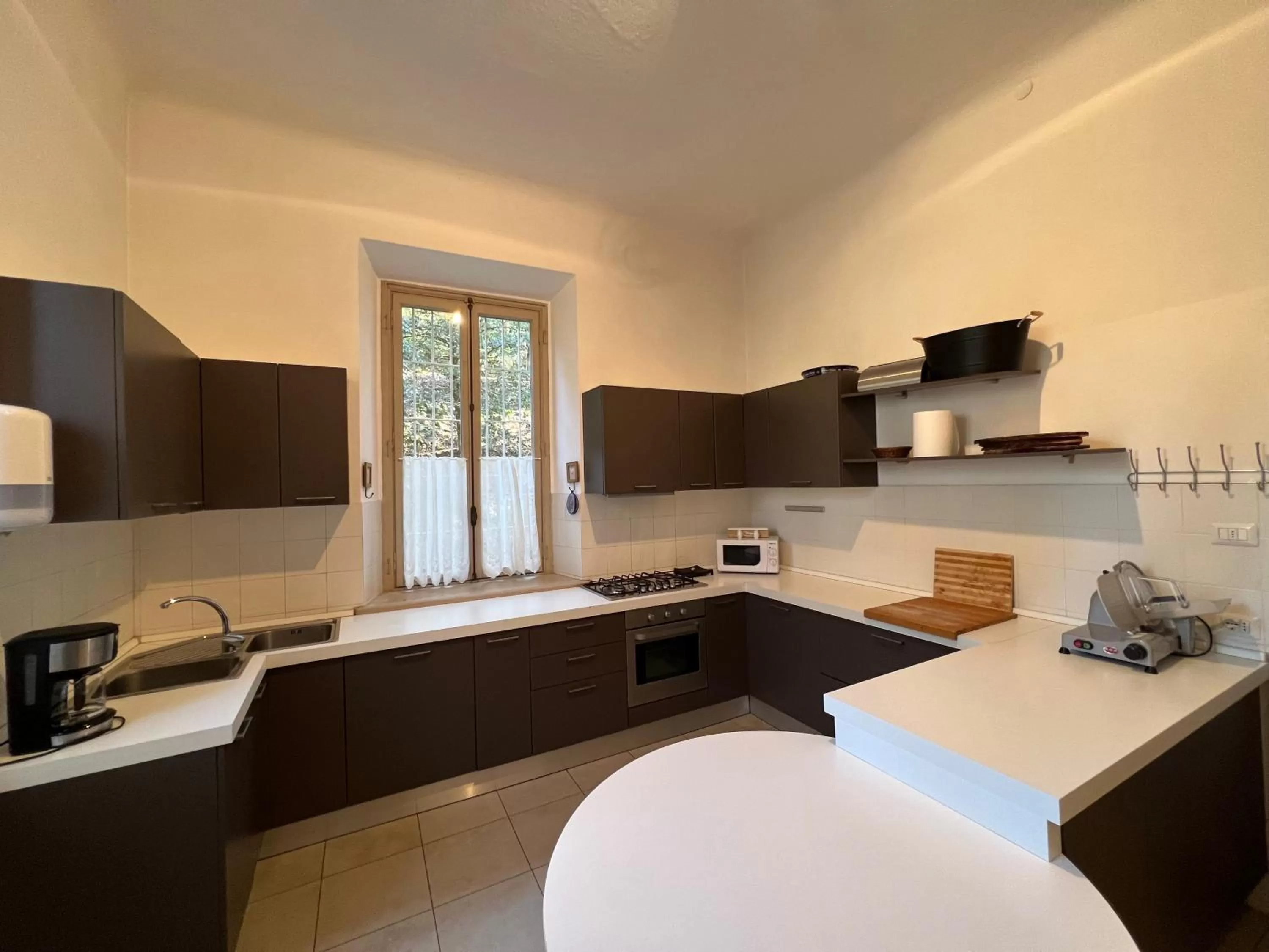 Kitchen or kitchenette in La Villa del Lago