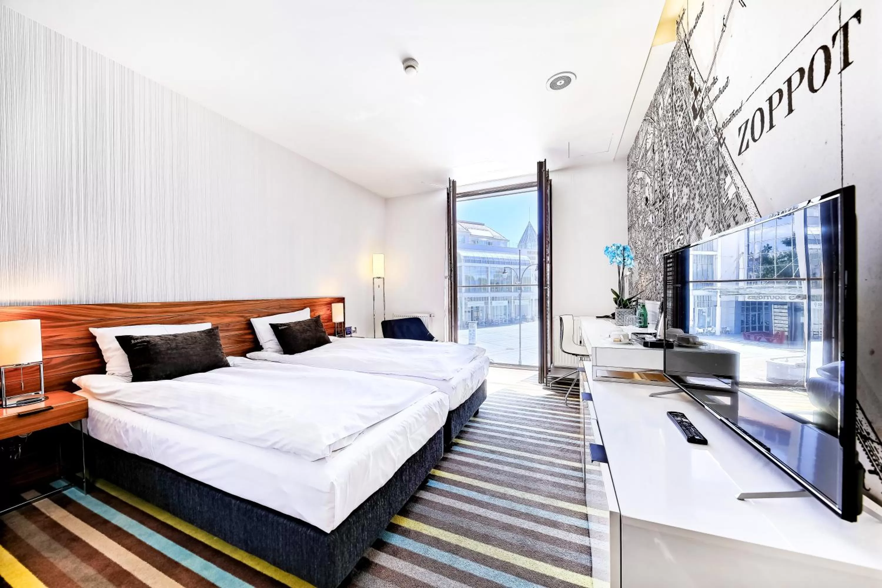 Bed in Bayjonn Boutique Hotel