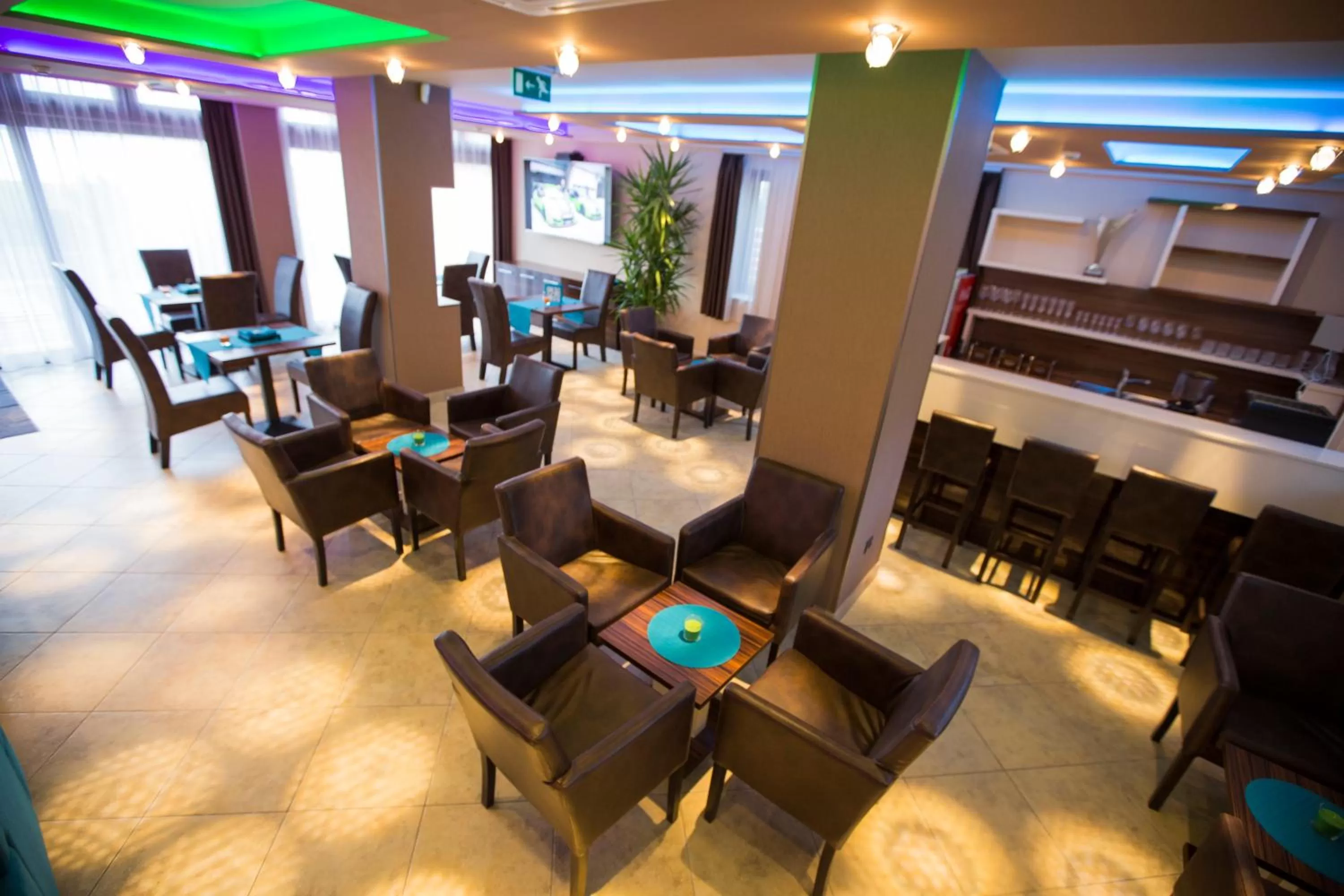 Lounge or bar in Pole Position Beach Hotel