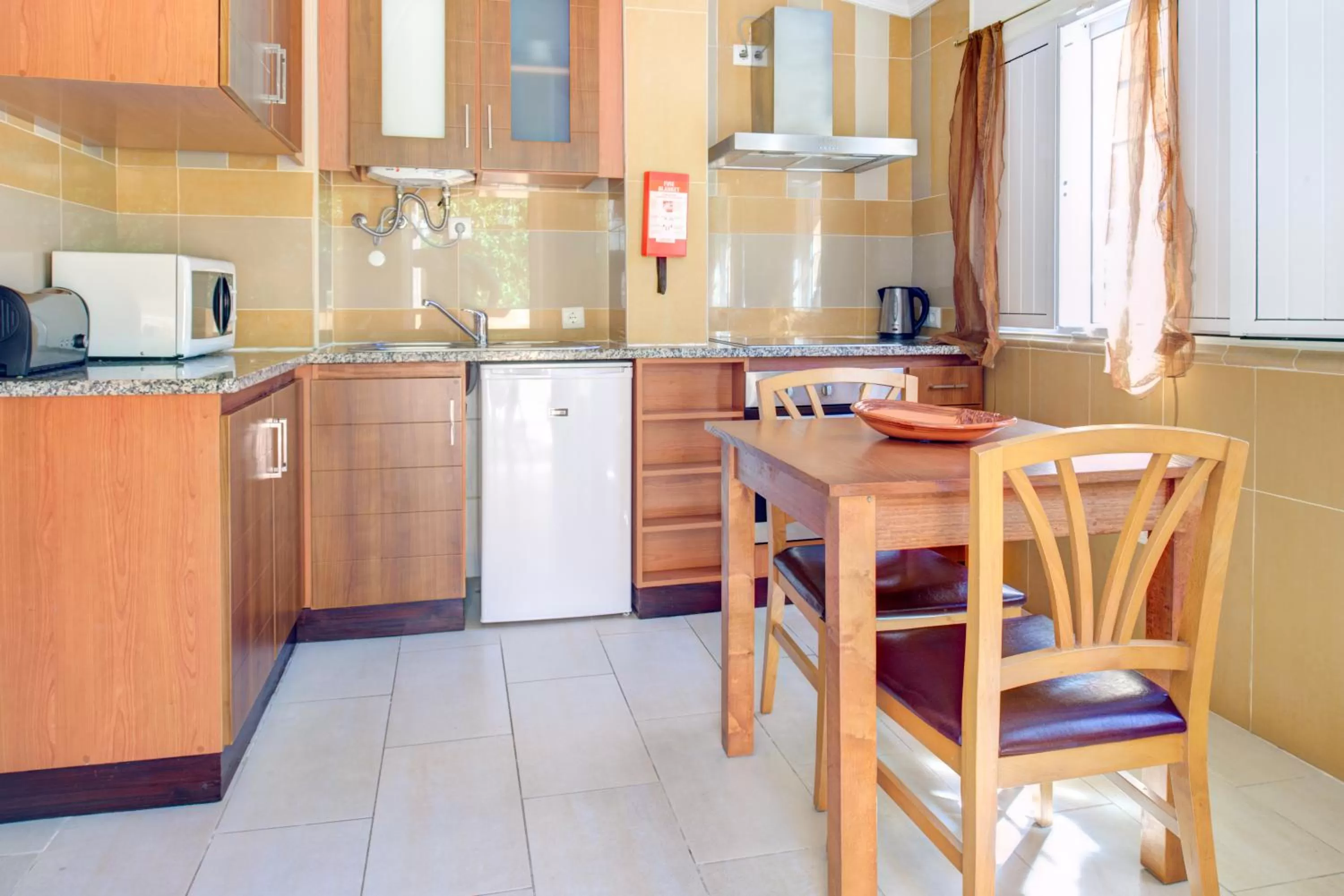 Kitchen or kitchenette in Choromar Apartments
