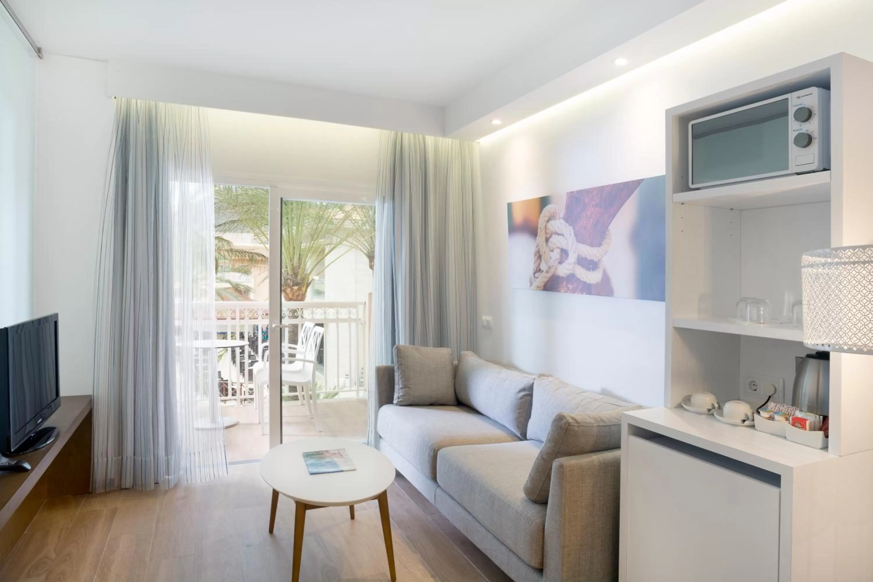 TV and multimedia in Mar Hotels Playa Mar & Spa