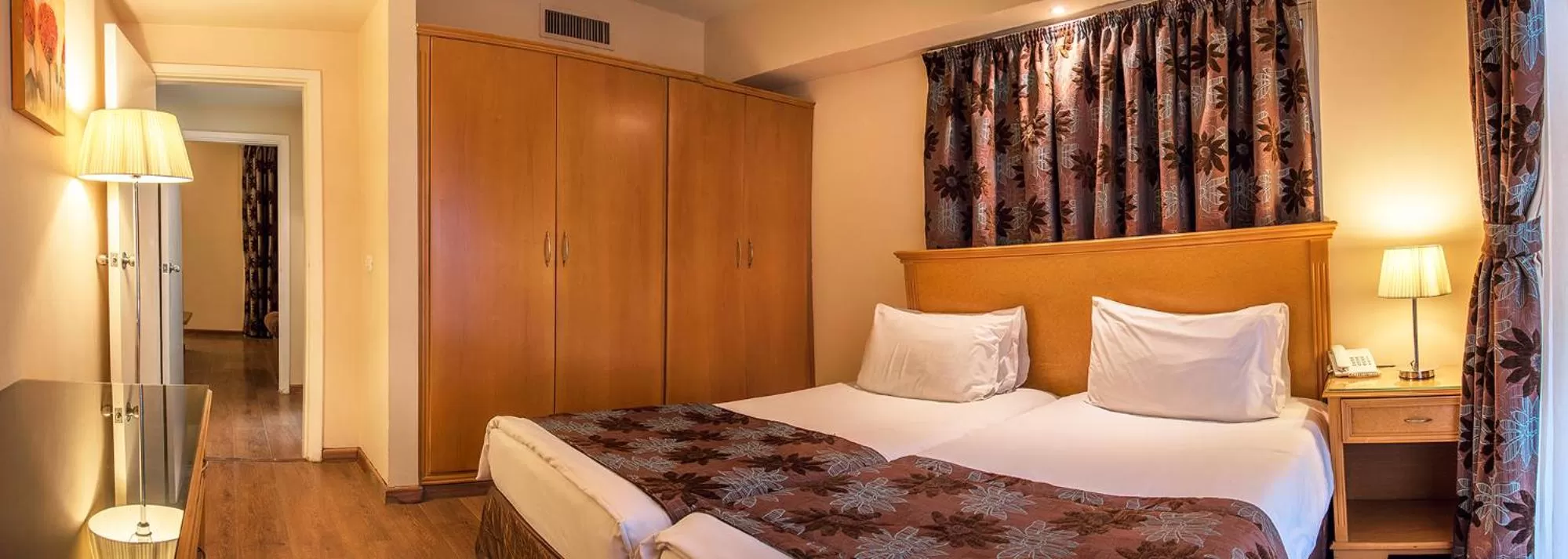 Bed in Bella Riva Hotel